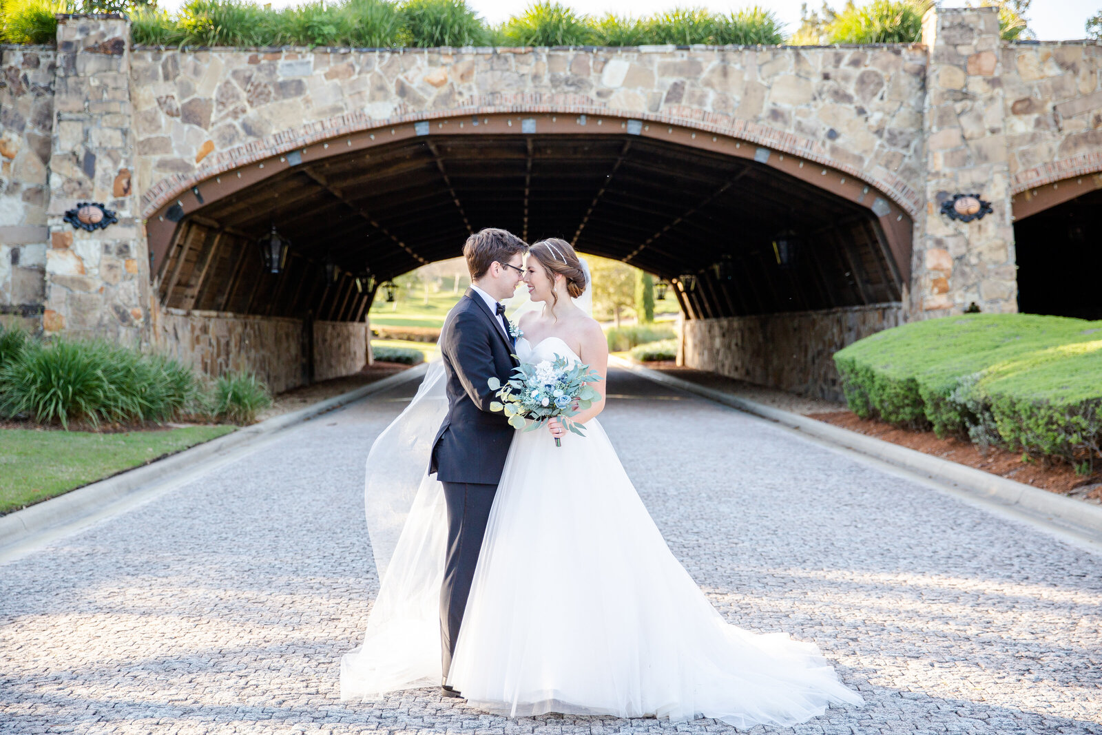 Orlando couple shares kiss by Riley James.