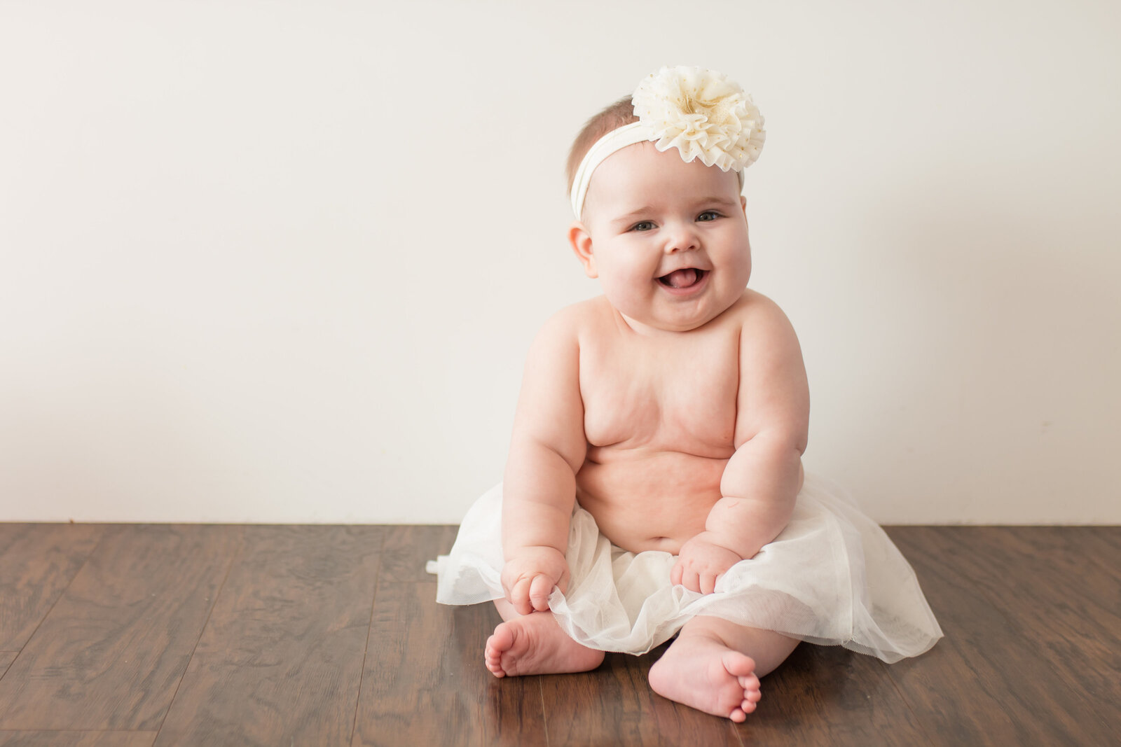 portrait of 6 month old baby during photography session 