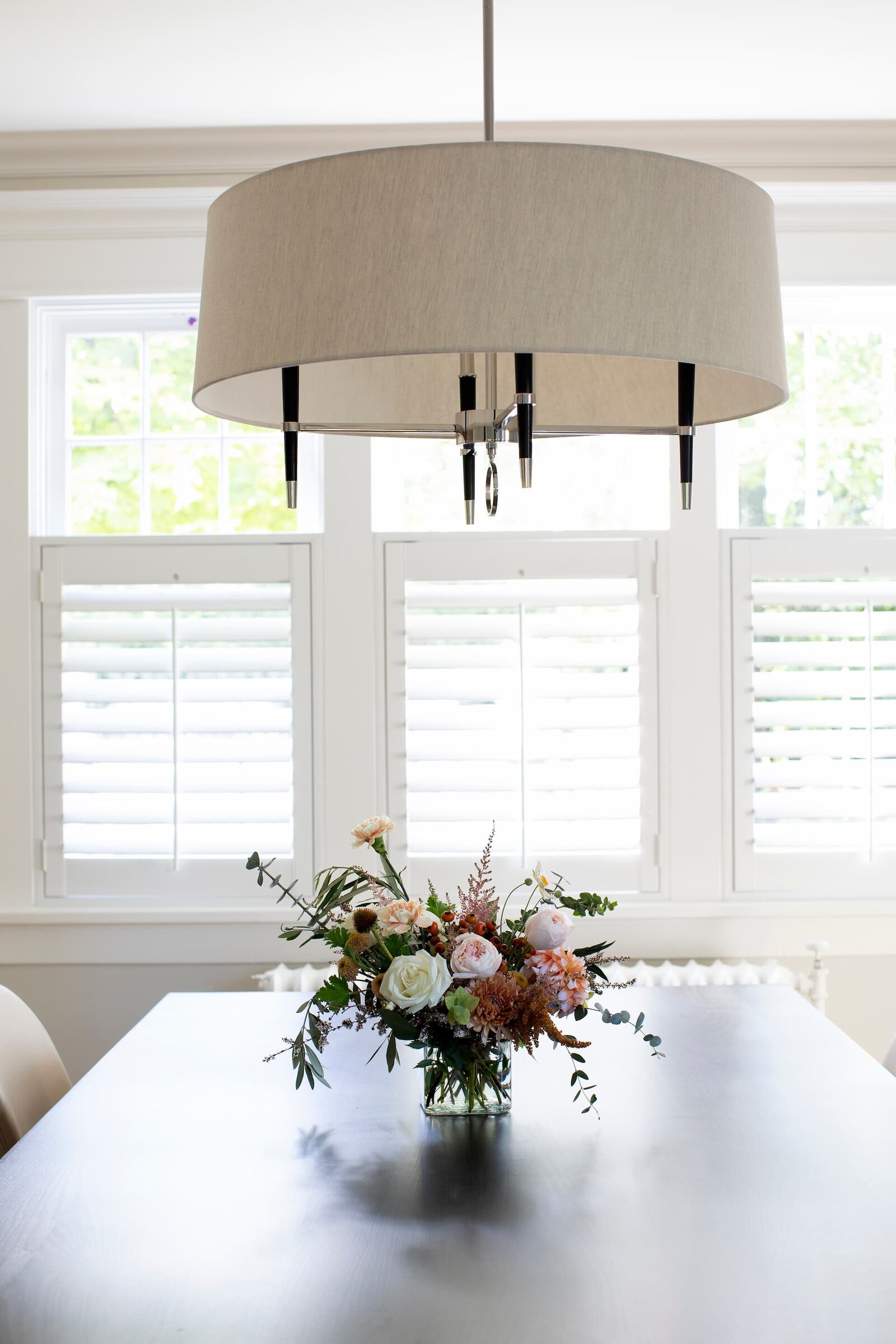 Granville Street l Dining Room l Chandelier and Floral Centerpiece