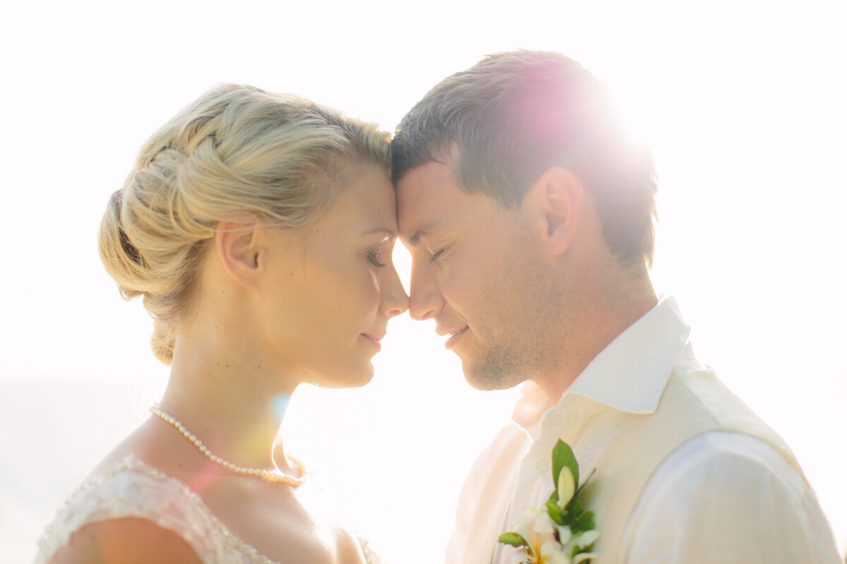 quiet moment between bride and groom during their wedding photos