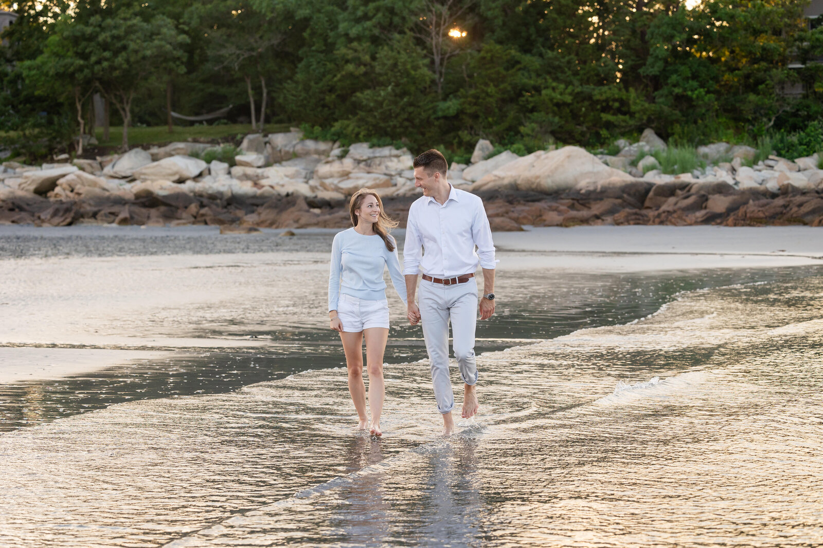 beach-engagement-cohasset-couple-walks-on-beach