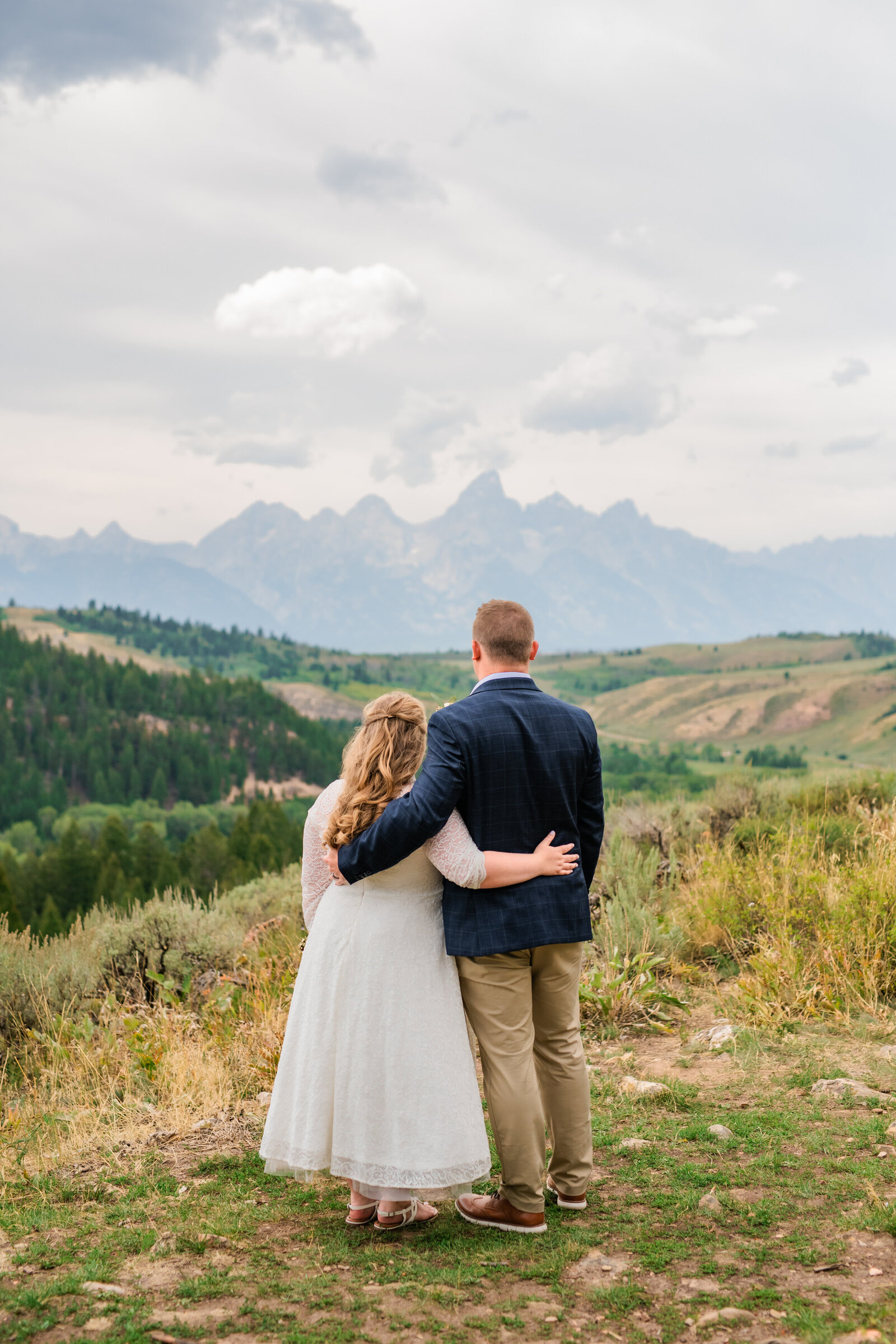 Jackson Hole videographer captures bride and groom hugging after Grand Teton elopement