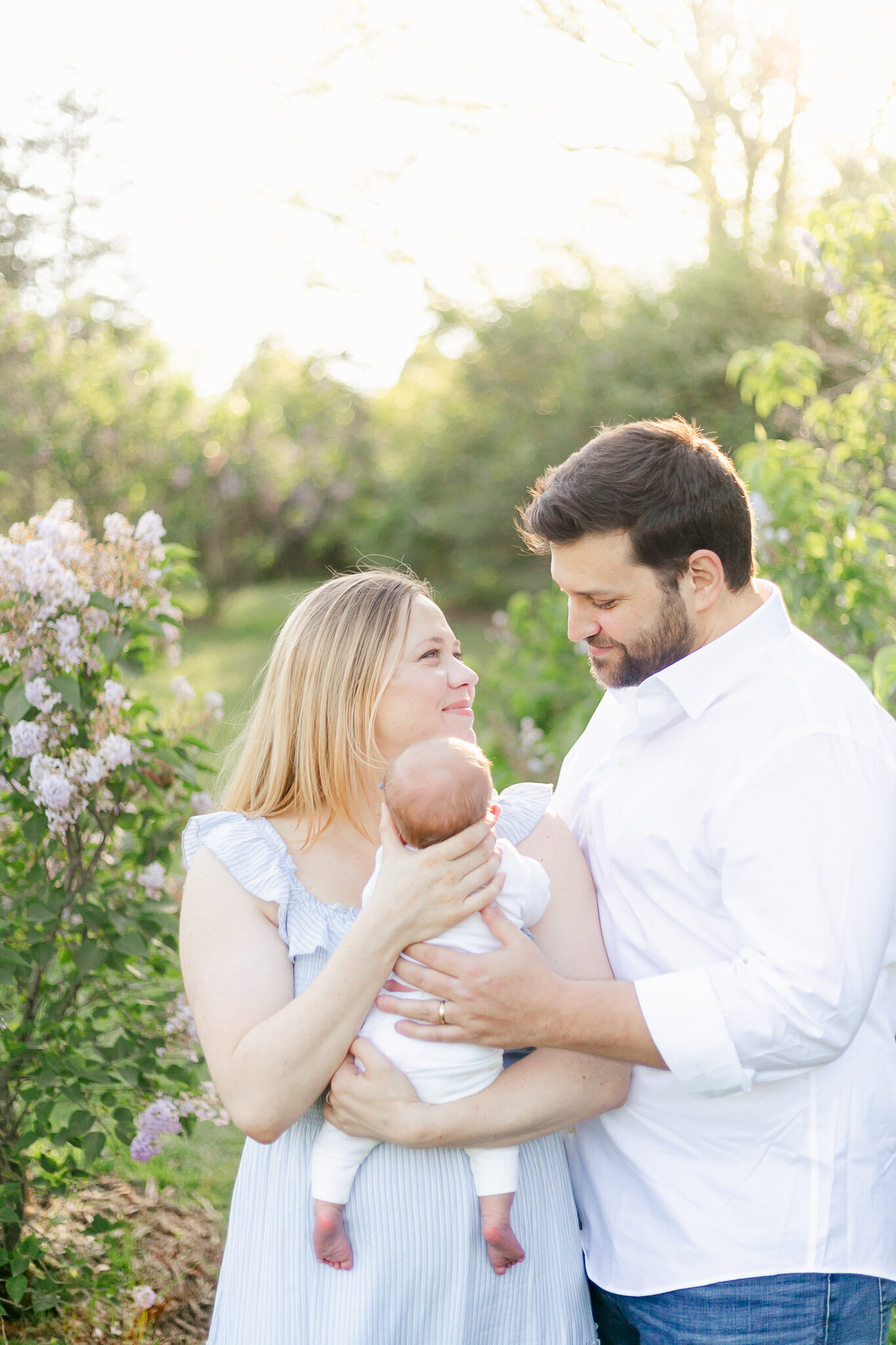 A golden hour newborn photography session in Rochester NY's Highland Park.