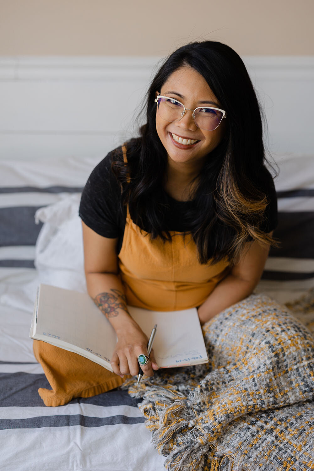 woman smiling during branding photos in Ashburn,VA