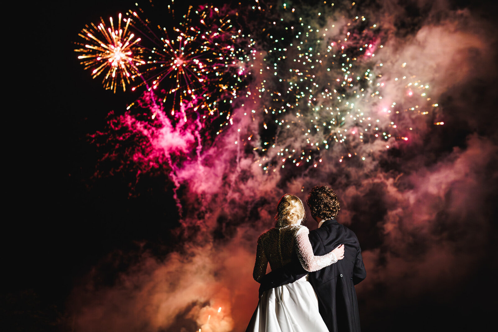 CL-kent-wedding-photographer-bride-and-groom-watching-fireworks-111