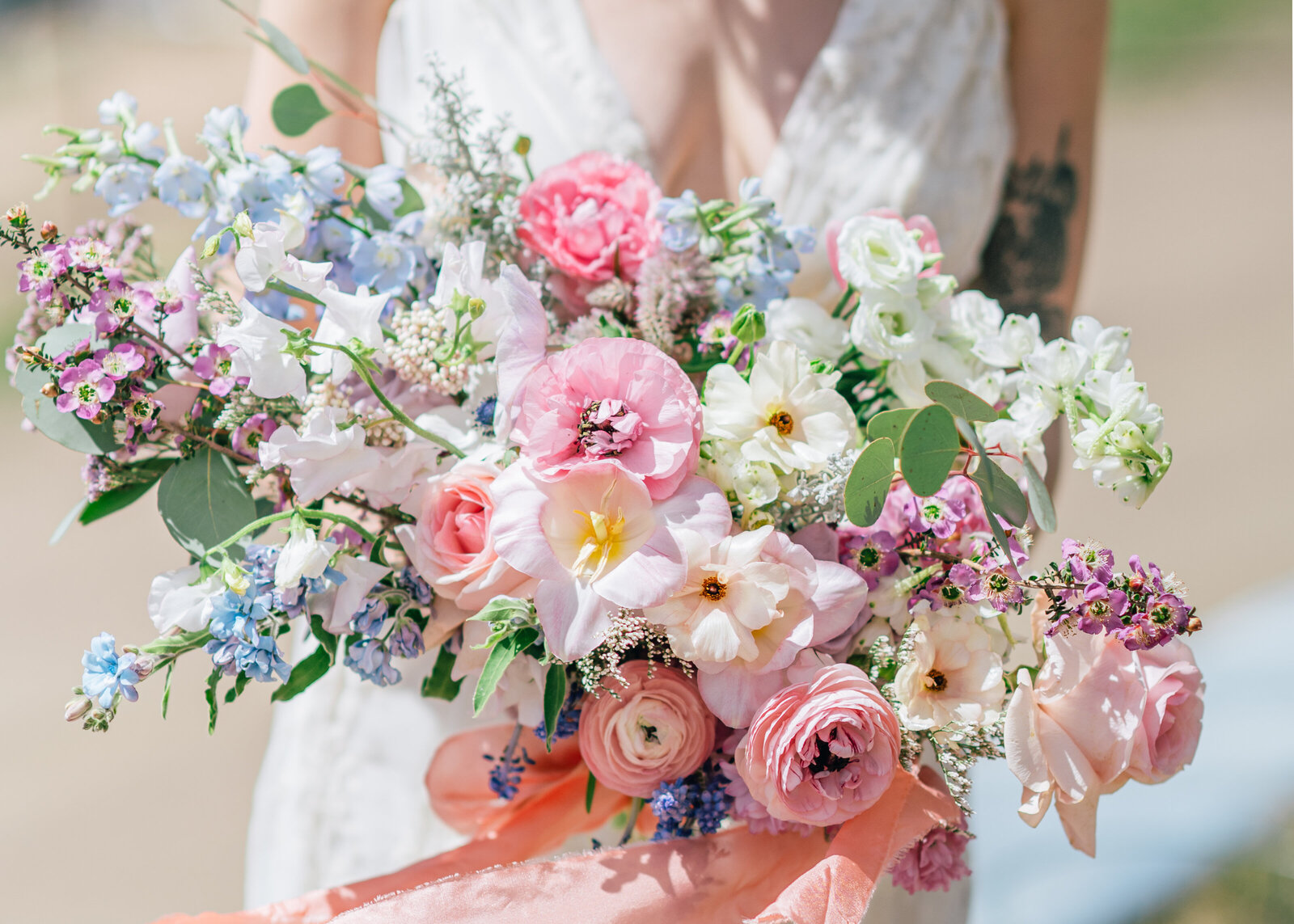 Beautiful floral bouquet at Denver wedding by photographer Erin Winter