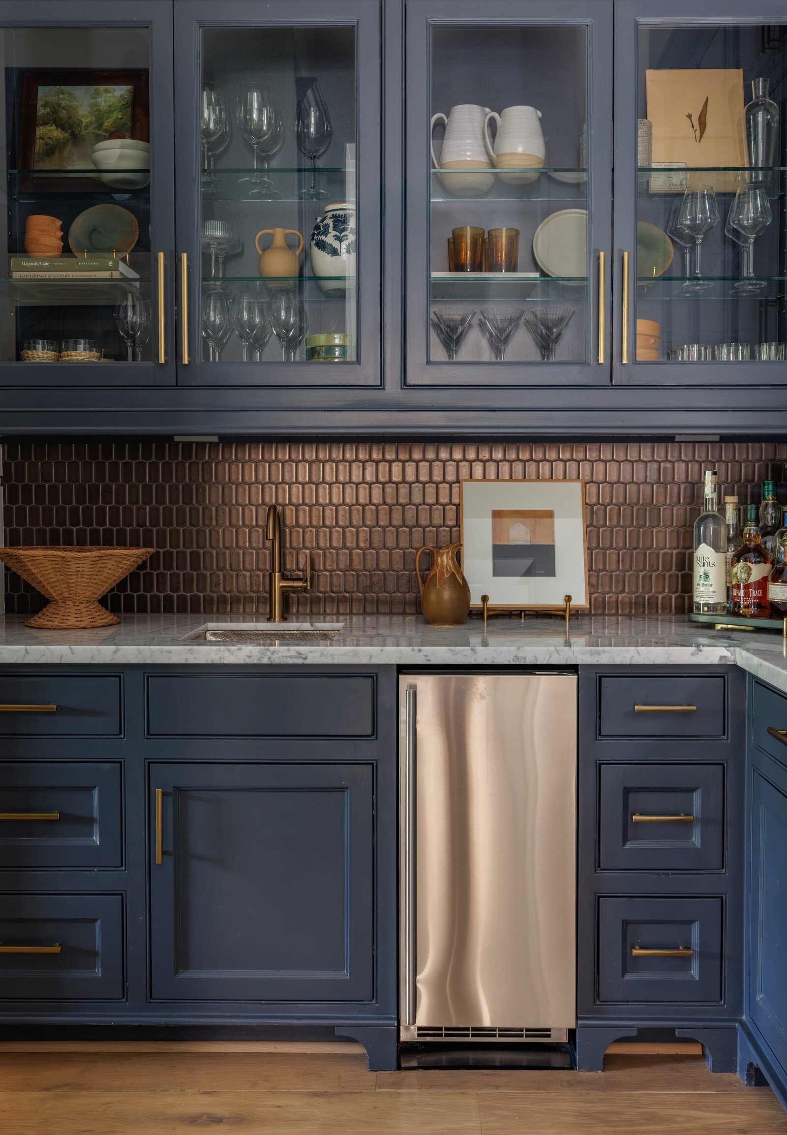 vision and hammer styled shelves with blue glass cabinets