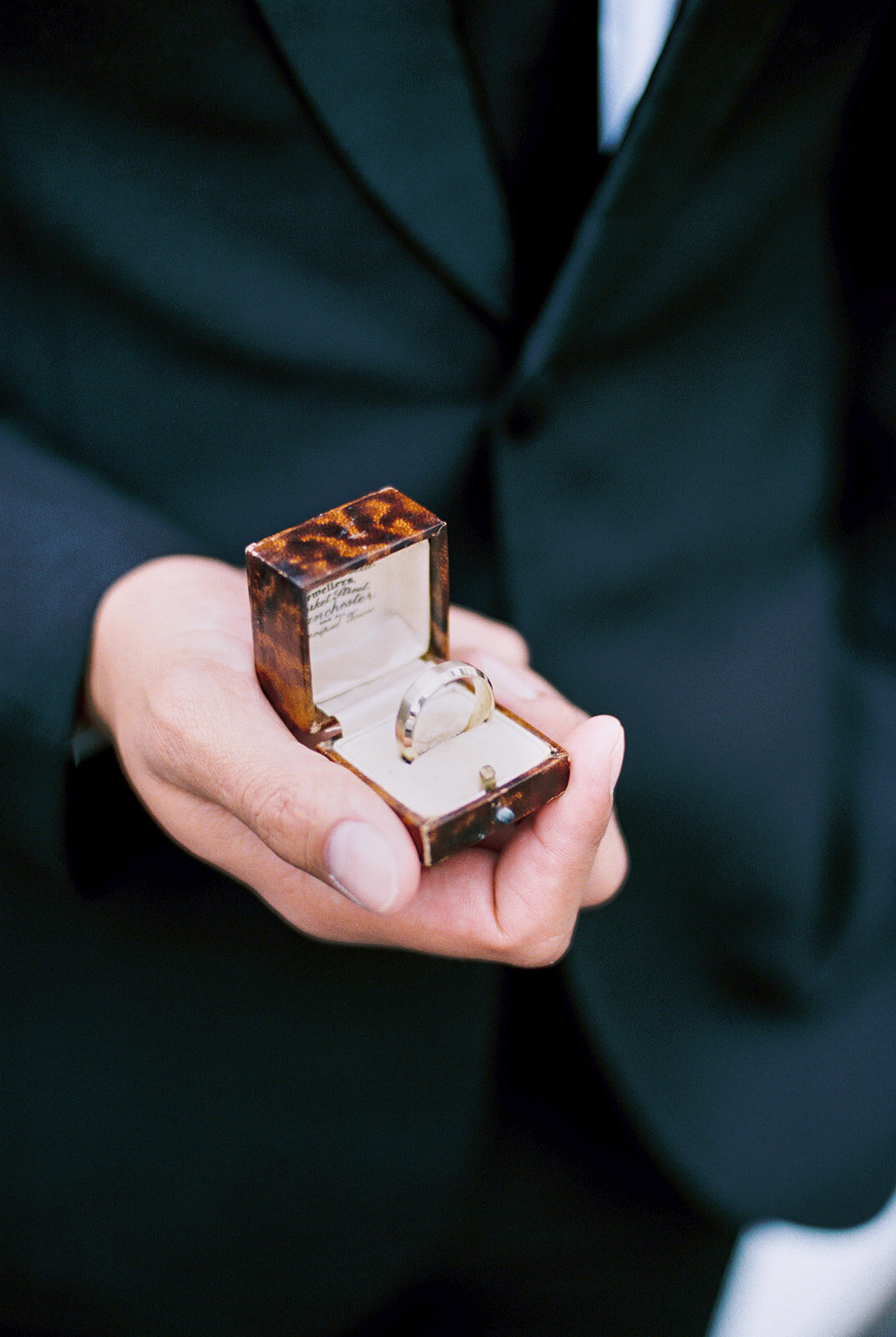 Groom holding proposal antique ring box at Cottage at Riverbend Wedding by the Best Boise Wedding Photographers