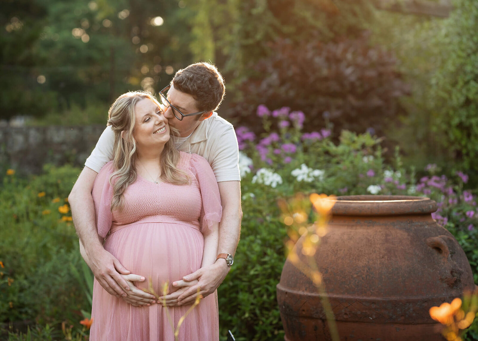 NJ family photography session of expecting couple at Cross Estate Gardens