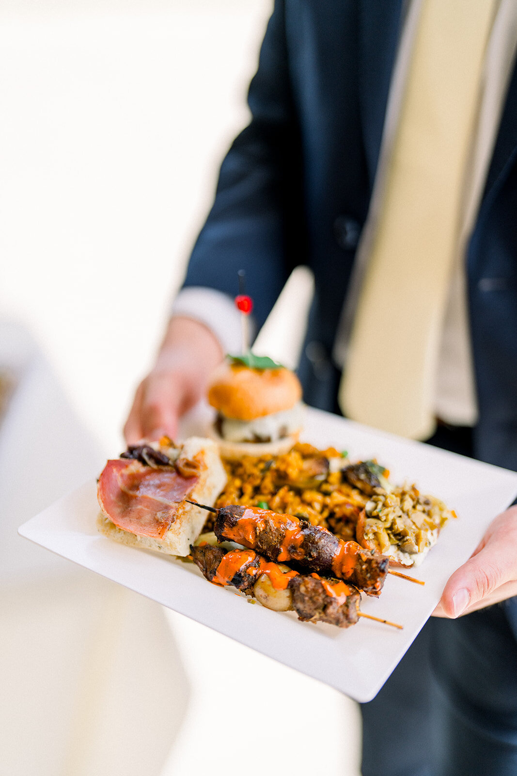 A close-up of an exquisite gourmet dish served at the luxurious wedding reception held at Filoli Estate in Woodside, California.