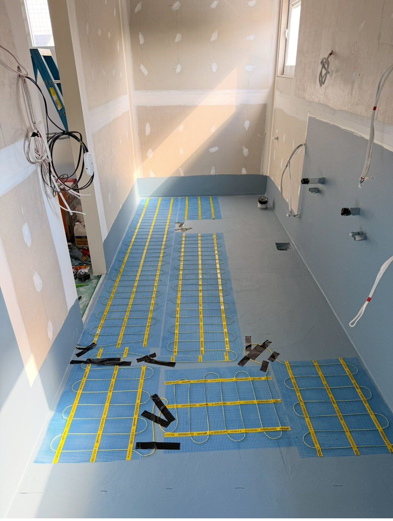 Heated floor installation by Captis Creations providing comfort and efficiency in Perth homes