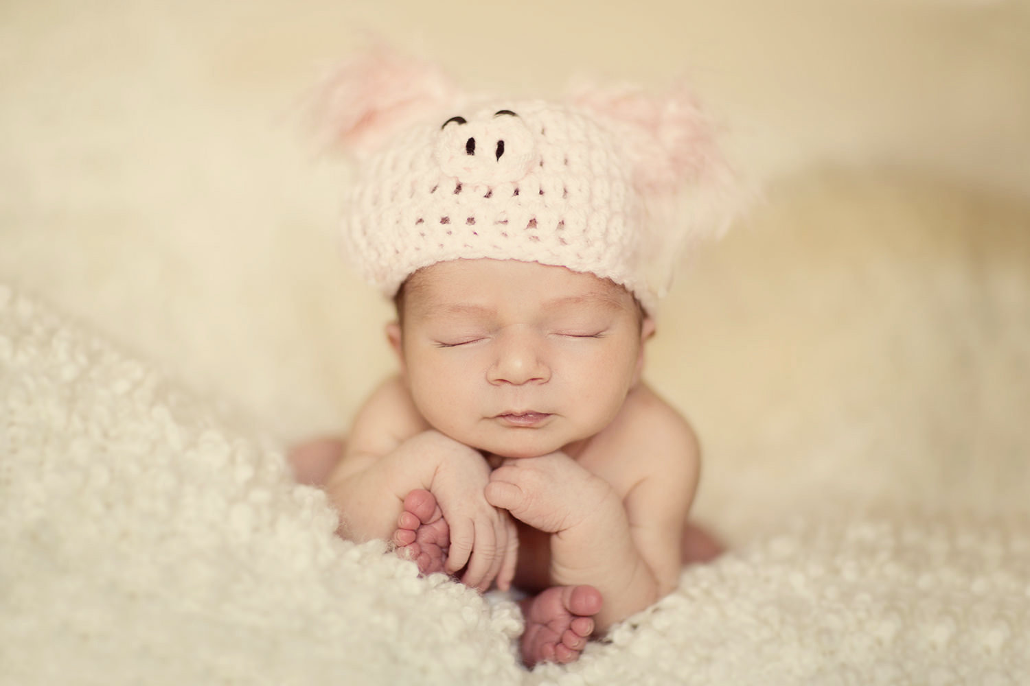 san diego newborn photographer | newborn with cute pink hat with feathers