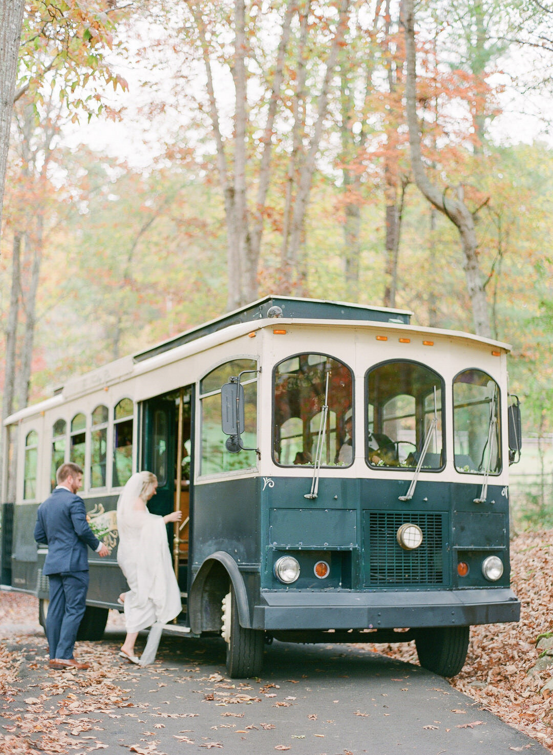 Bride and Groom getting on trolley