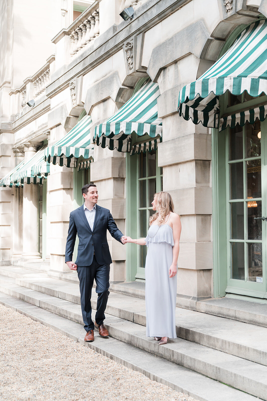 Larz Anderson House engagement photo in Washington DC with couple walking outdoors