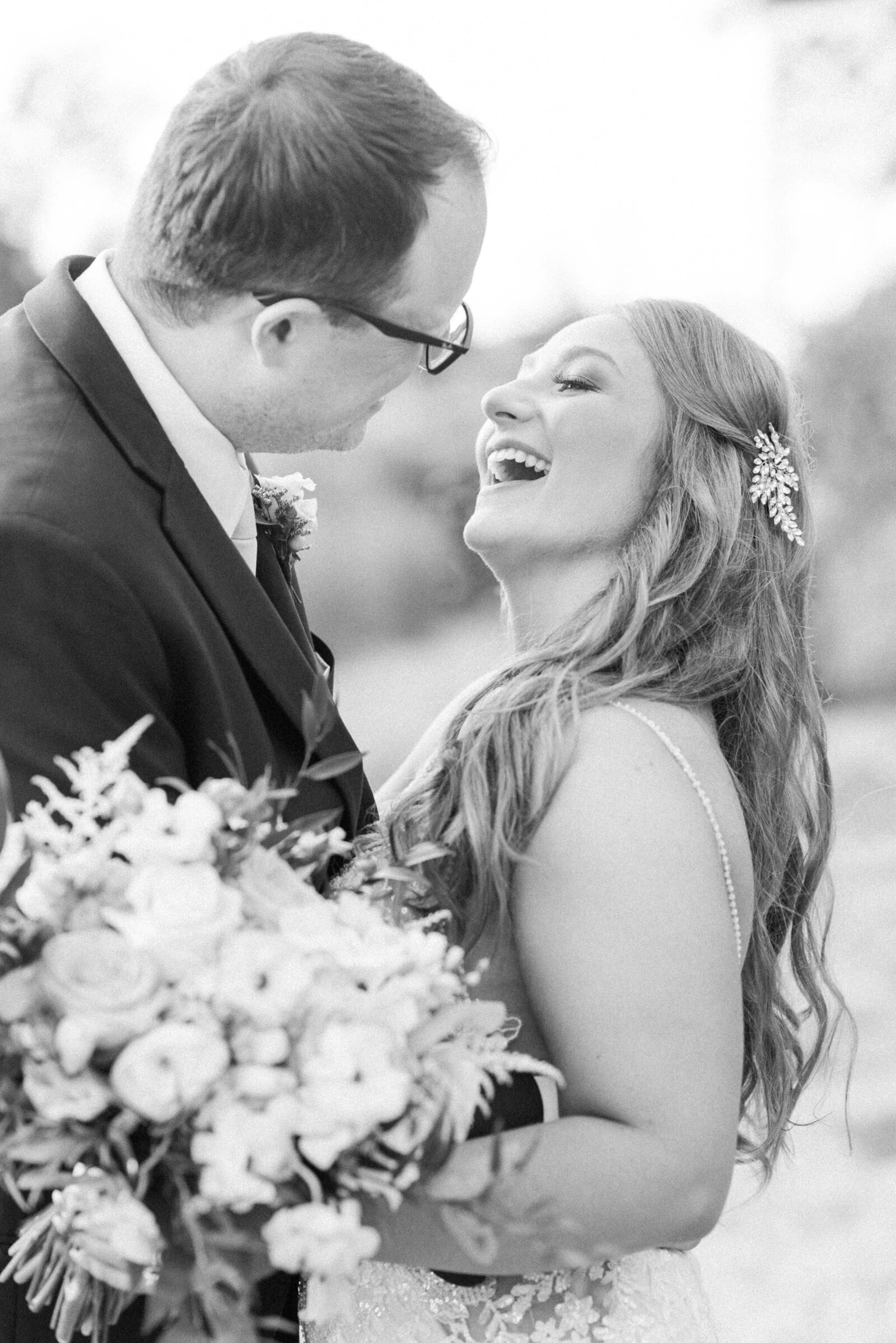 happy couple on the beach smiling on wedding day