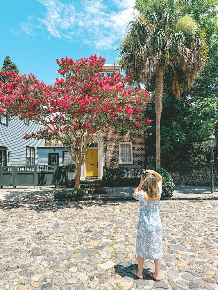 girl taking pictures in charleston
