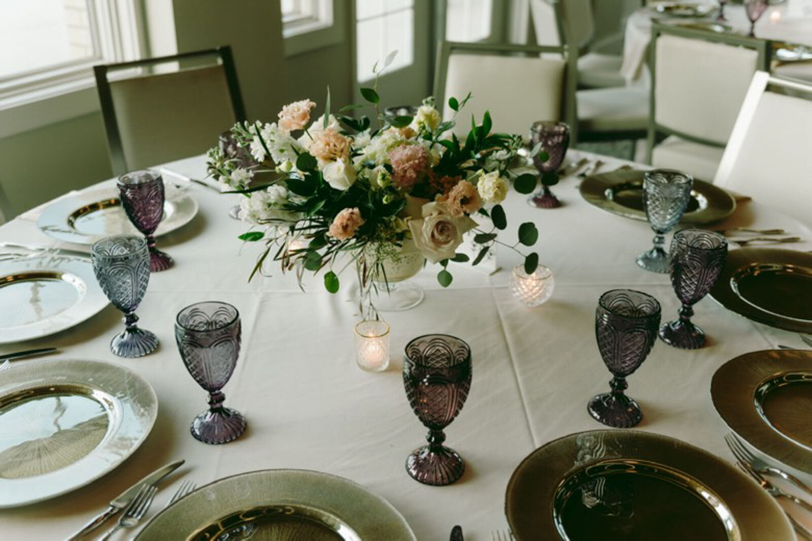 Floral centerpiece on table of North Carolina destination wedding reception