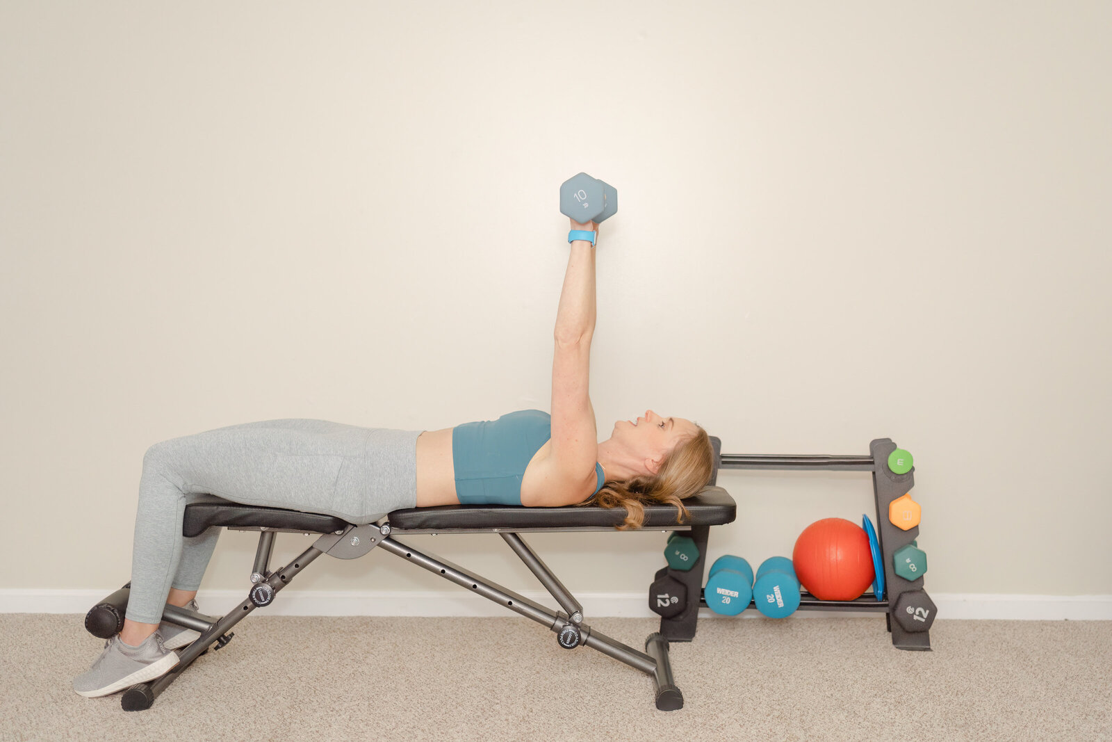 fitness coach lifting weights during Chantilly,Virginia branding pictures