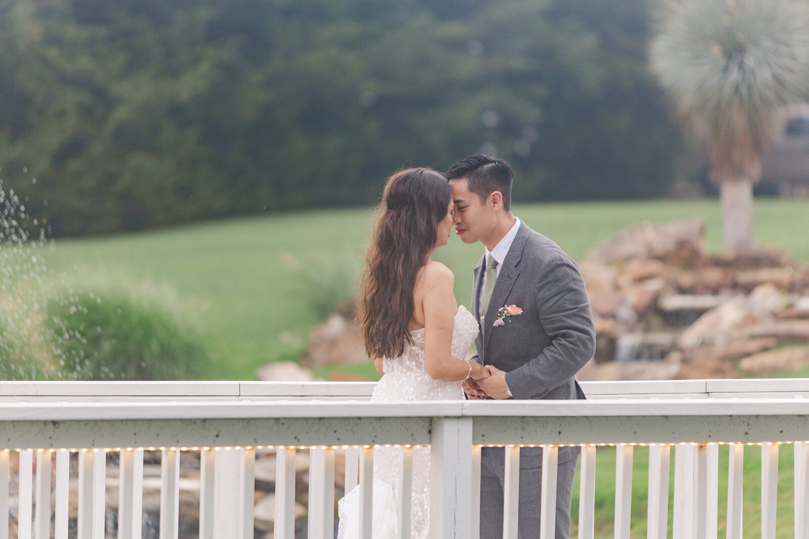 Bride and groom intimate portrait after first look at the bridge