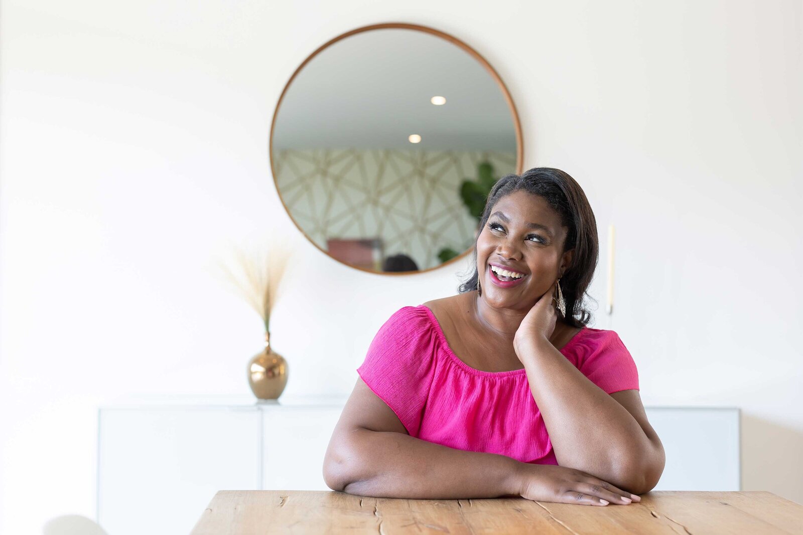 Sophie K. Hunter, brand photographer for entrepreneurs, capturing personal brand photography for a client in her Dallas office