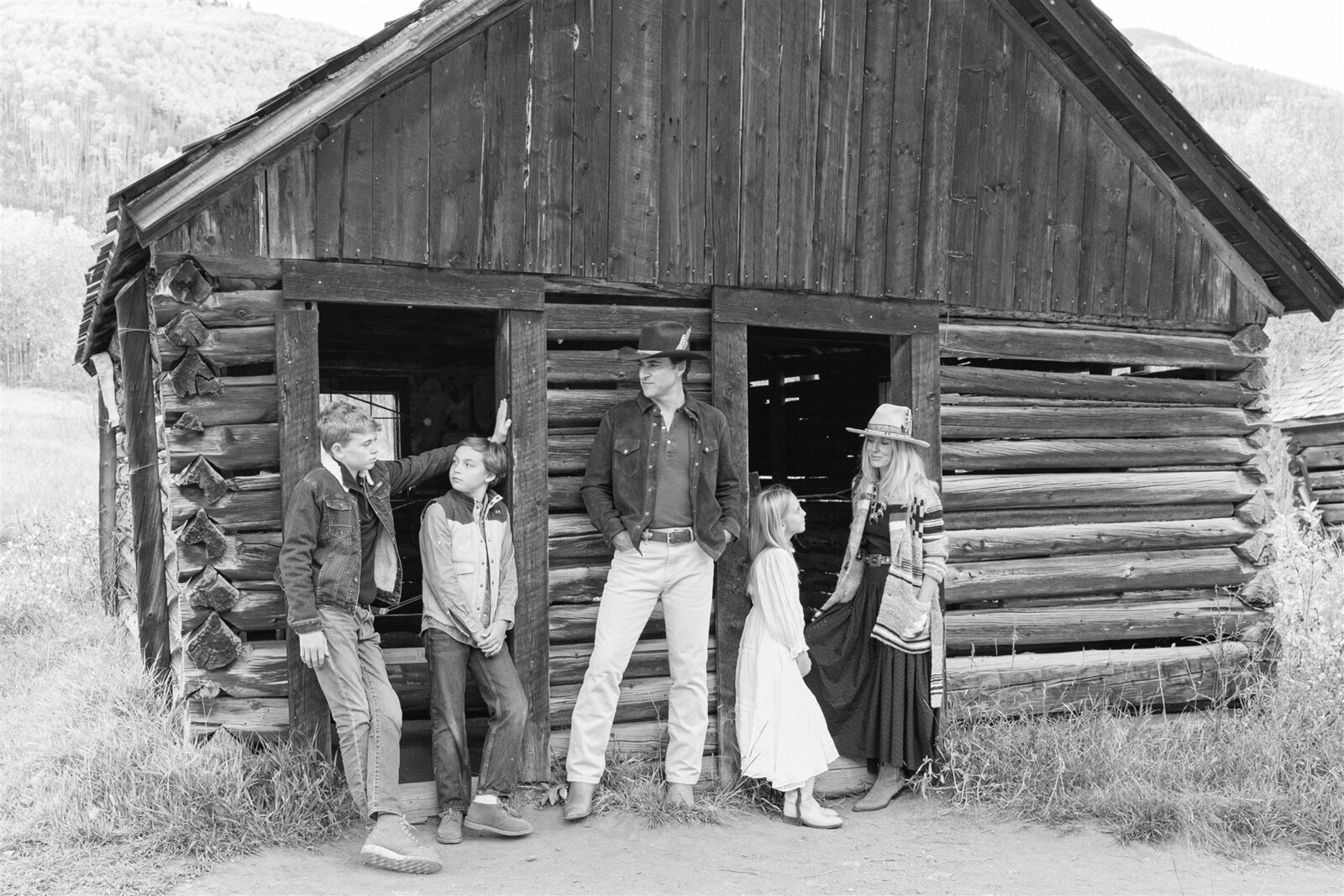 Aspen family photography with a Ralph Lauren aesthetic — navy, camel, and cream tones against alpine greens in the Roaring Fork Valley.