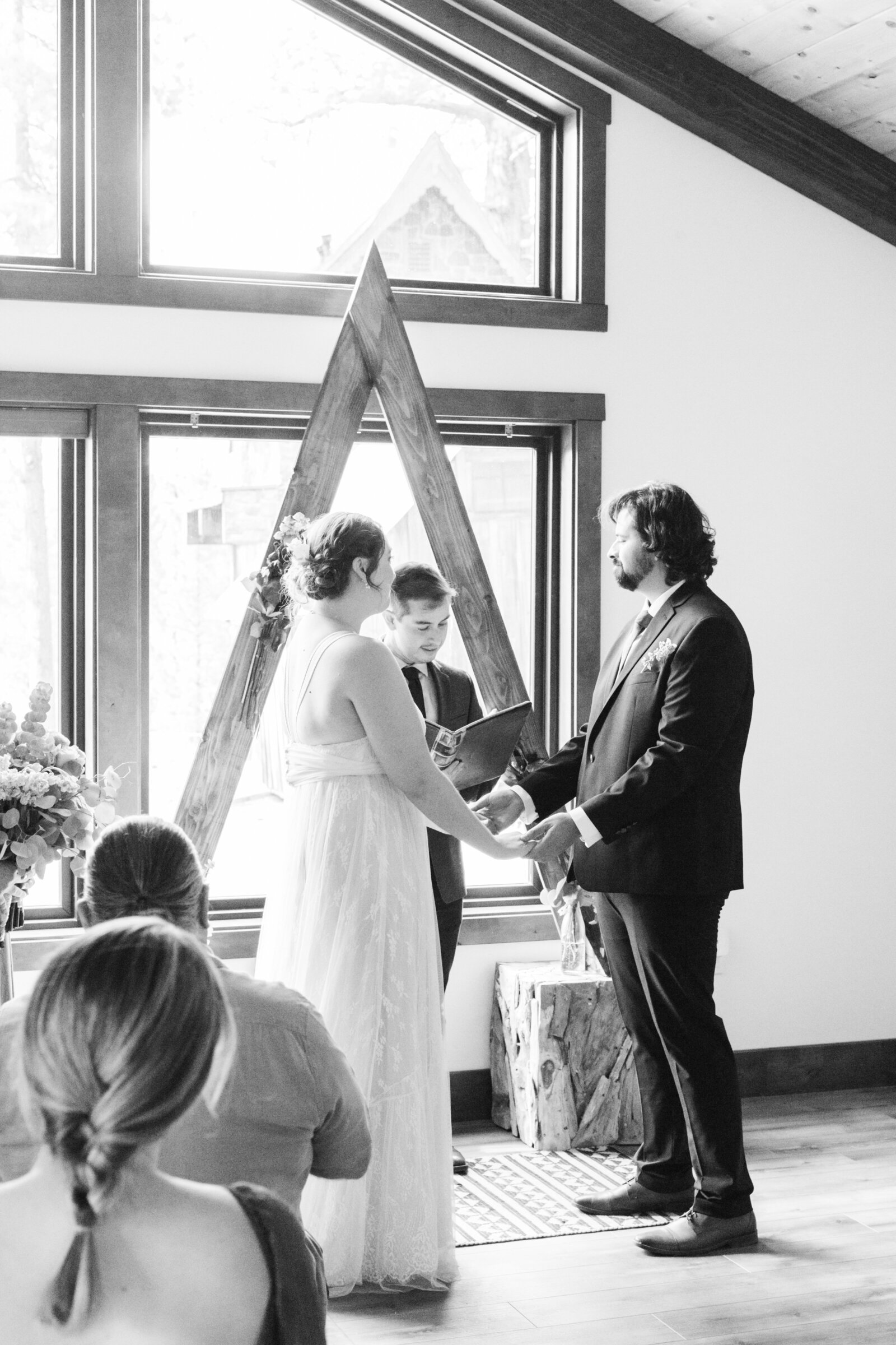 A couple celebrates their intimate elopement at a cabin at Big Bear Lake, California.