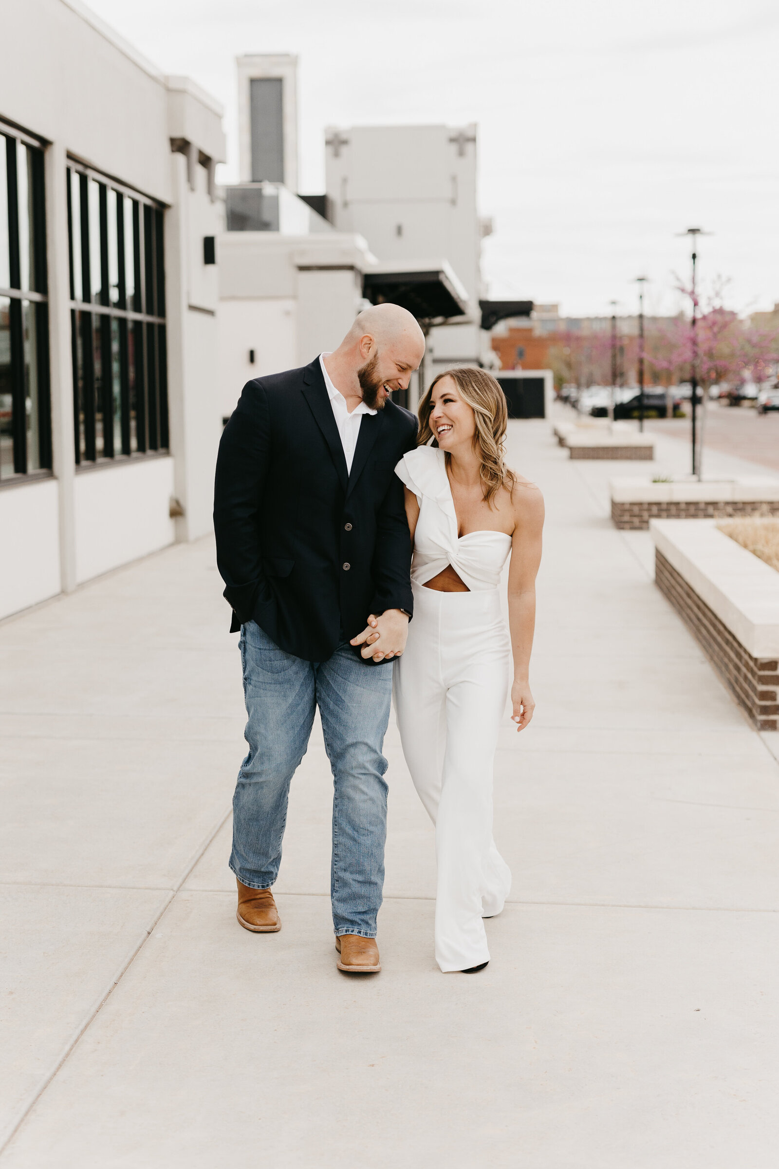 One Shoulder white jumpsuit for engagement photos in Wichita - Alex Bo Photo