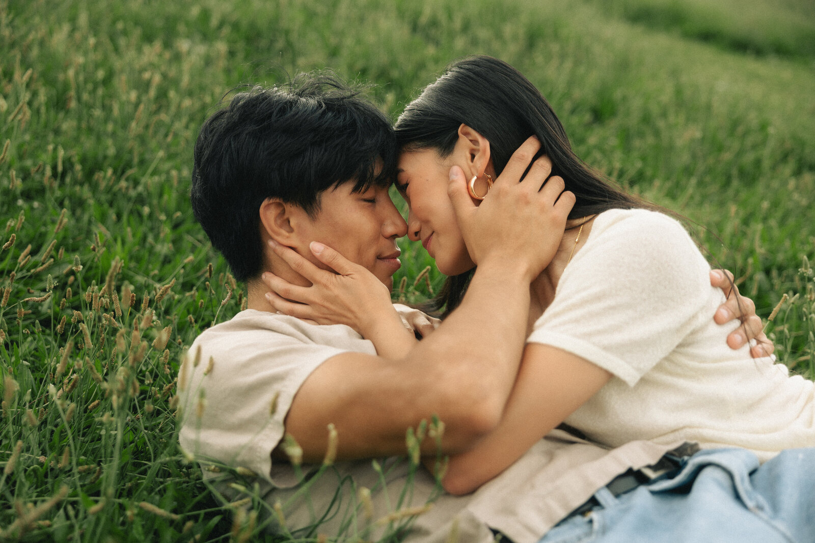 Intimate moment between a couple during their portrait session on Vancouver Island, photographed by Rae Terrillon.
