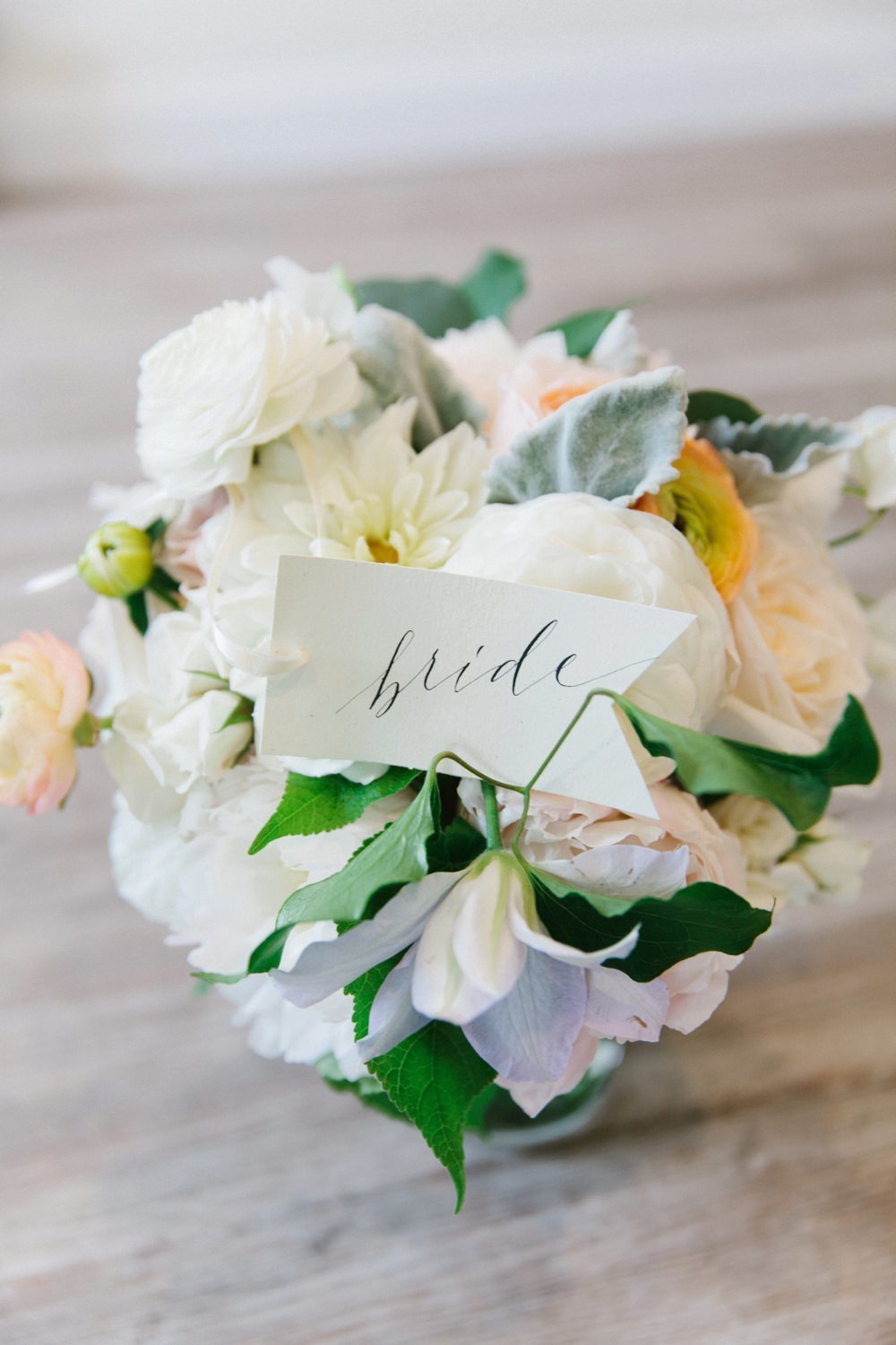 Gorgeous spring bridal bouquet in ivory, yellow and blush for Belle Mer Wedding