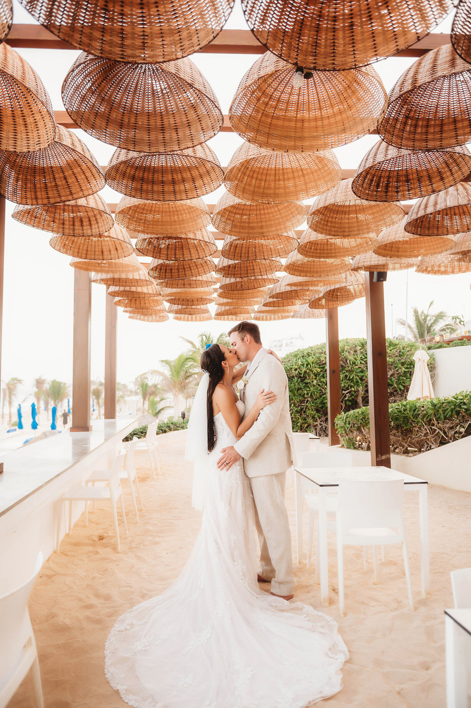 Newlyweds embrace on their Elopement Day at Live Aqua Resort in Cancun Mexico.