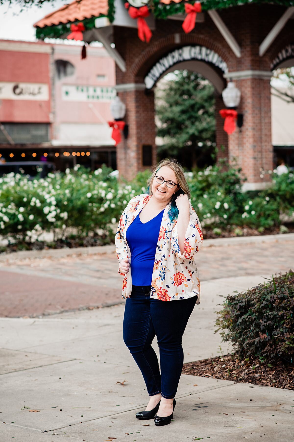 Downtown Winter Garden Village at Christmas, Mahlia wearing a floral shawl