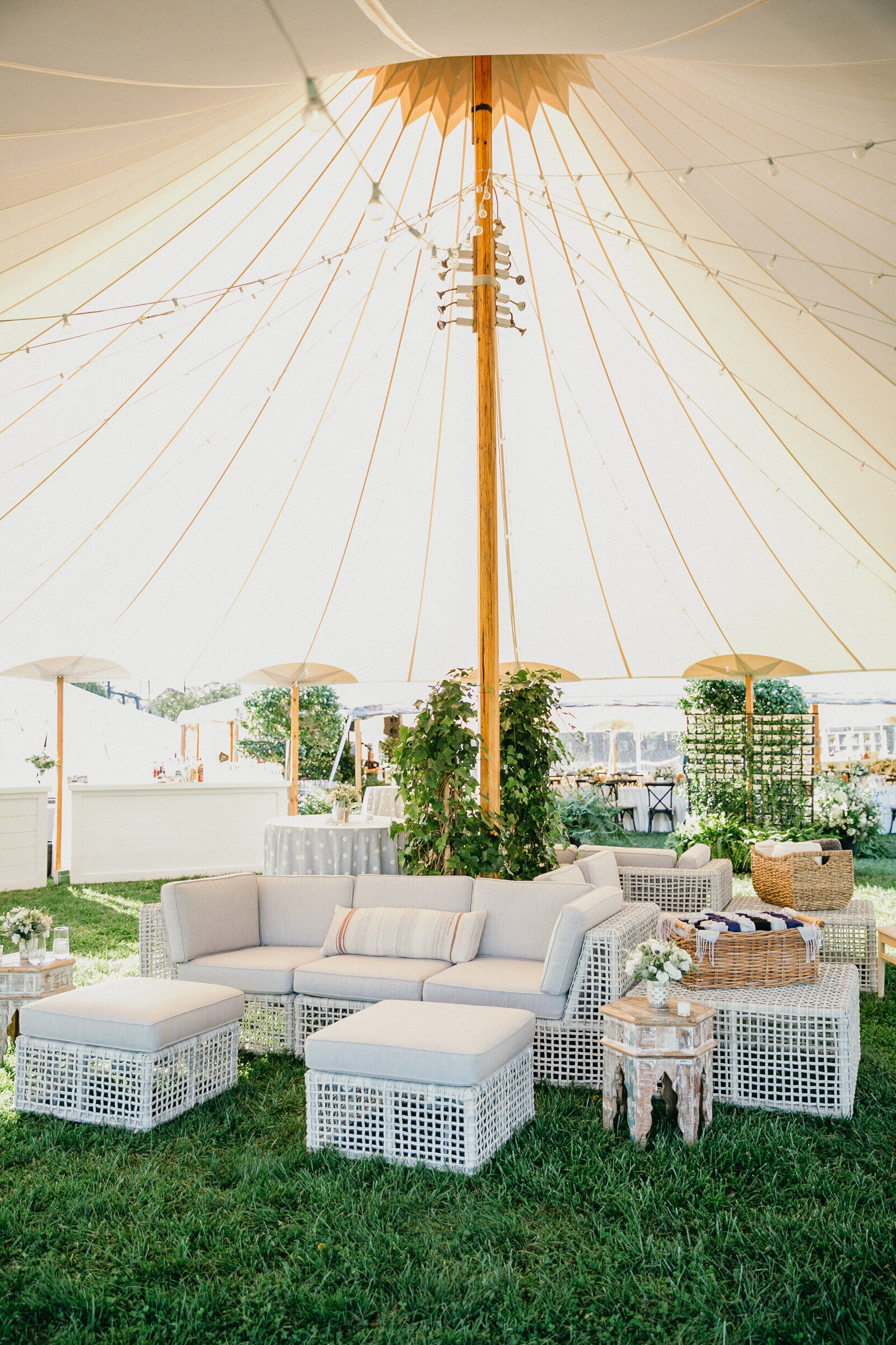 Chic reception décor inside the tent at a Radnor Hunt wedding reception. 
