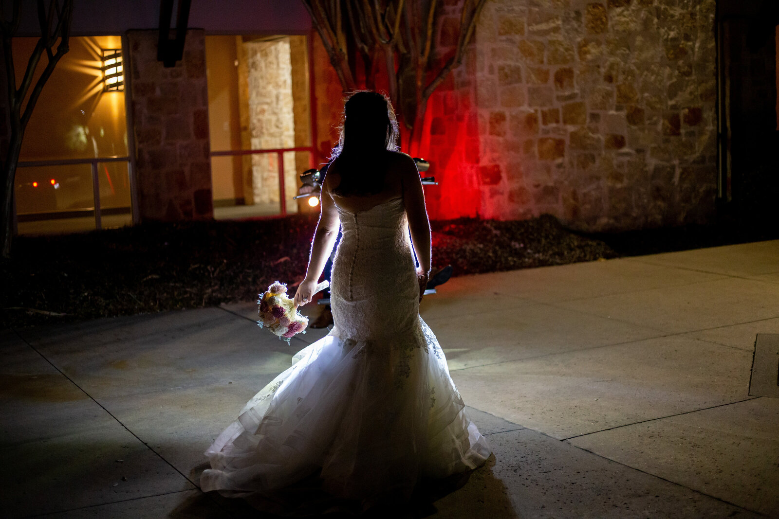 bridal portrait in front of motorcyle