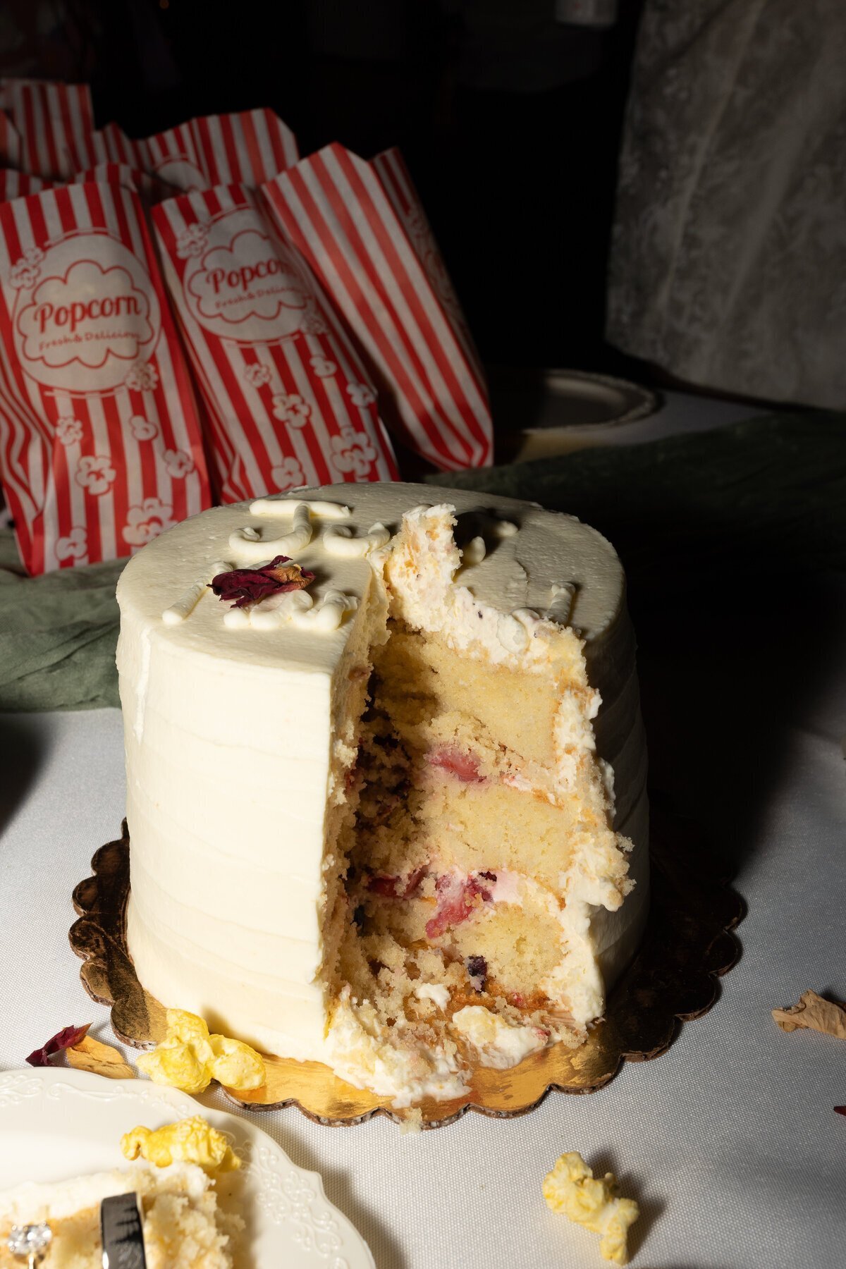 Wedding cake sliced by destination wedding photographers Erica Rochelle Photography