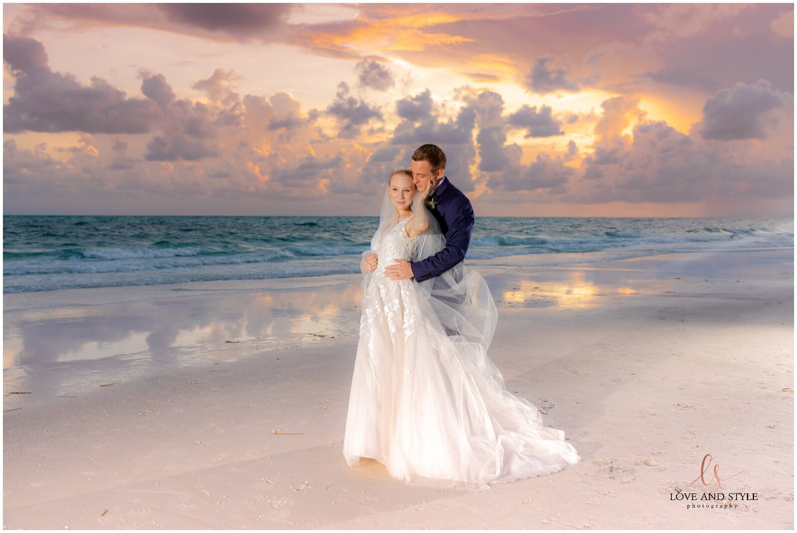 Anna Maria Island Wedding Photography with Bride and groom on the beach at Sunset