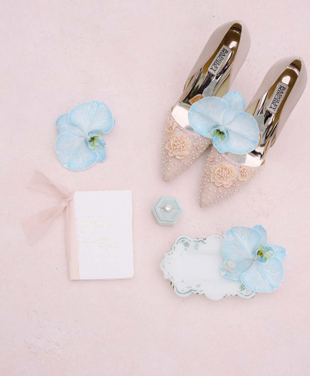 beautifully staged blue bridal accessories