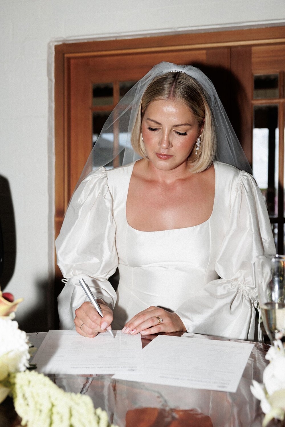 signing-wedding-paper-bride