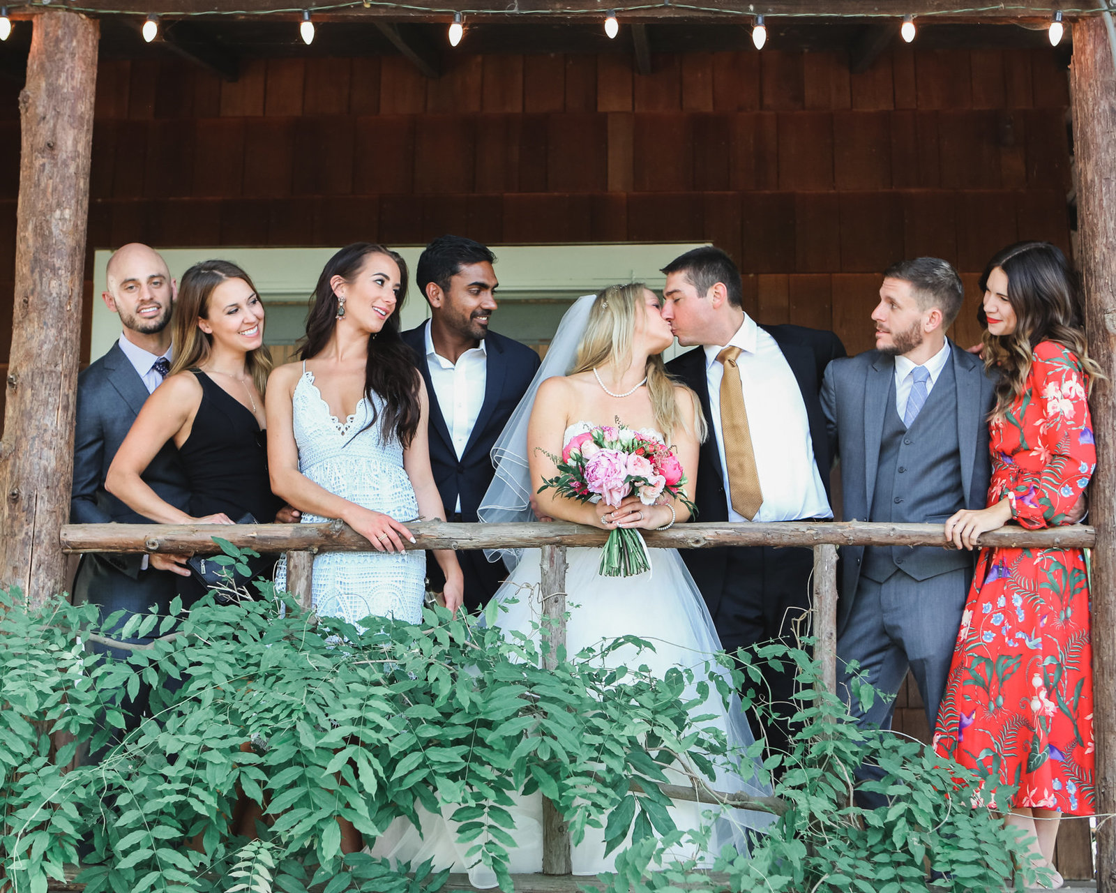 In beautiful rustic los altos wedding, the bride and groom pose with their familt
