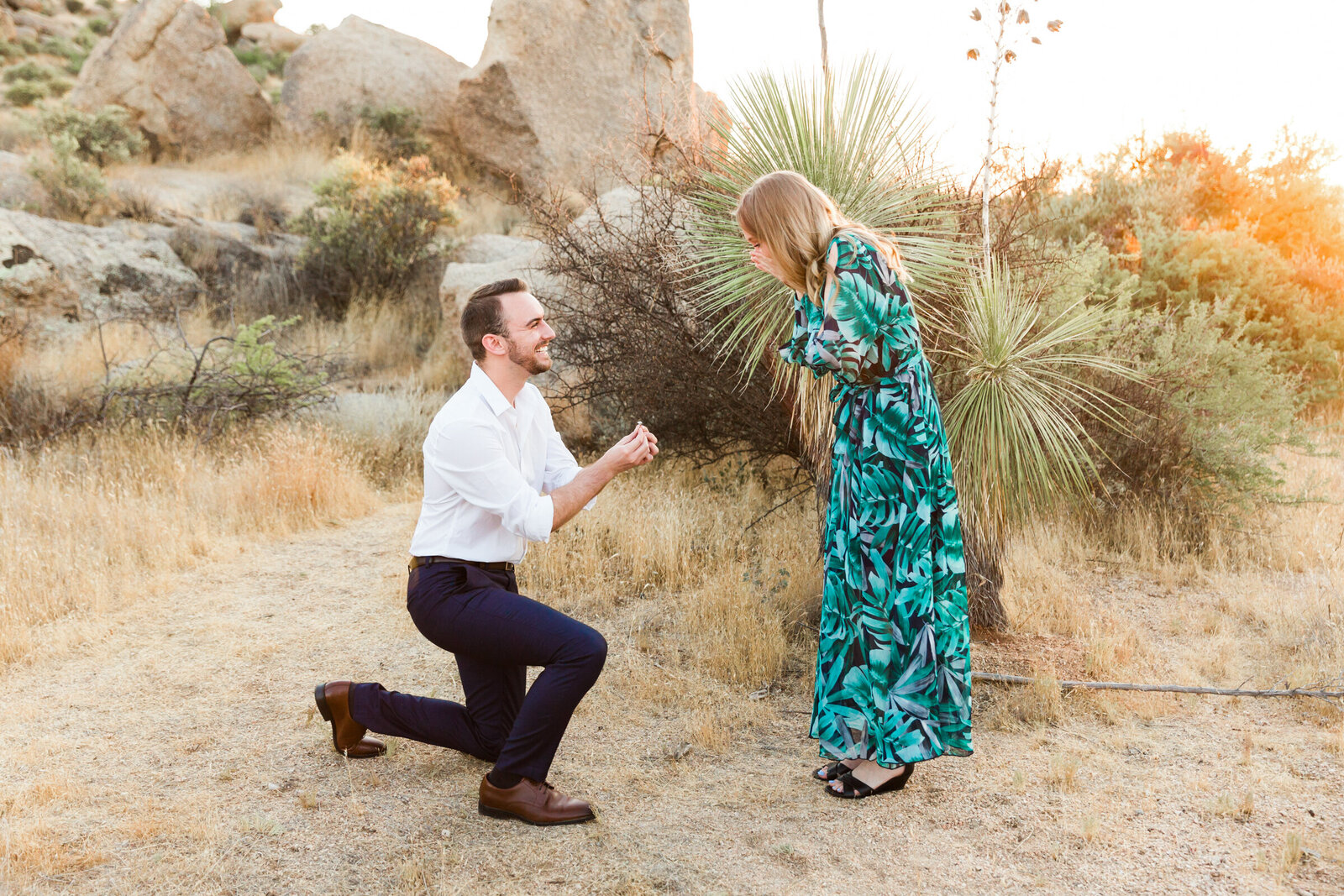 man proposing to woman in the Scottsdale desert