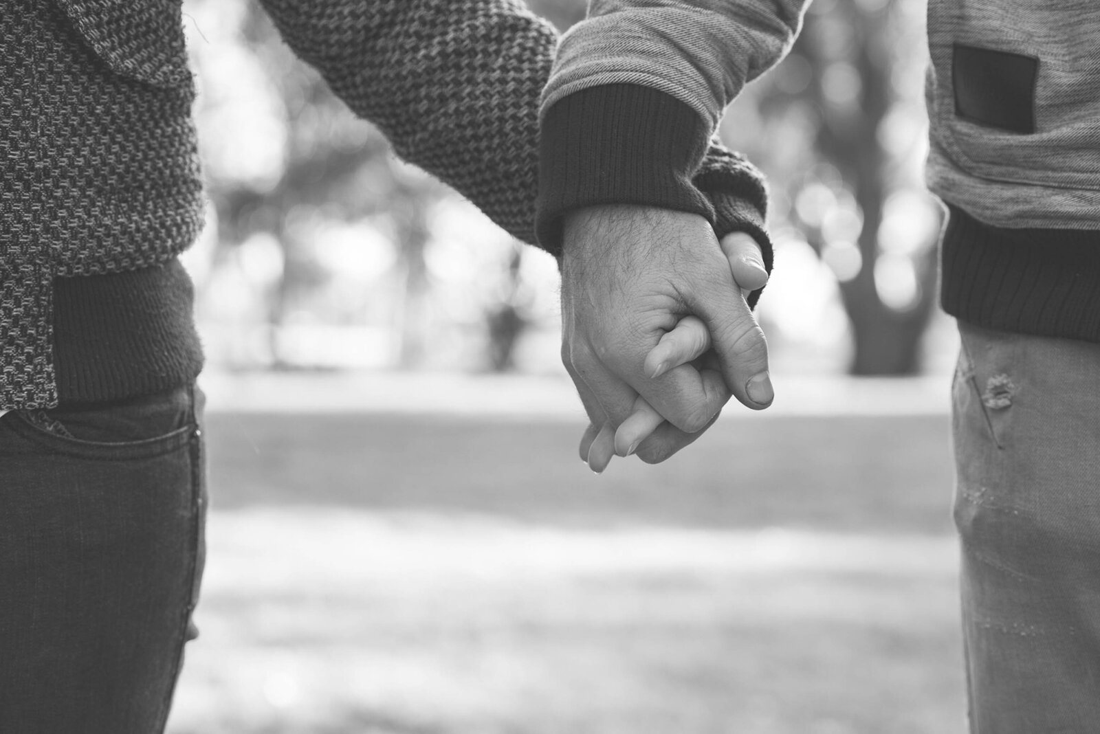 Couple holding hands