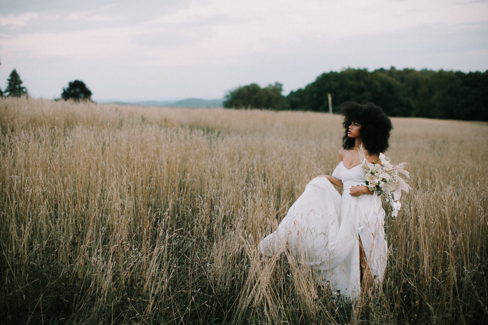 beautiful bride in open field upstate ny