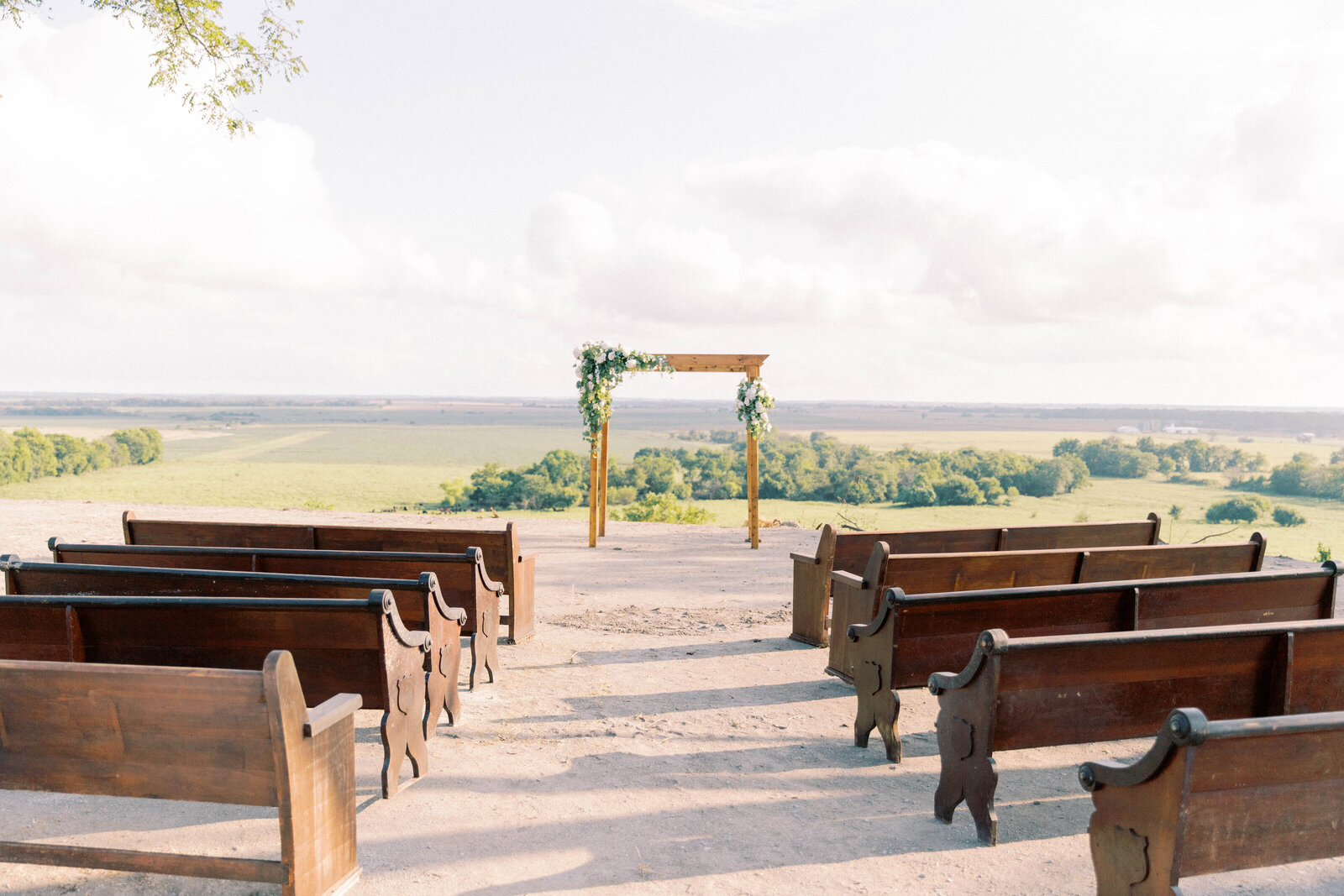 Church pews and wedding ceremony altar on family land  in Butler Missouri