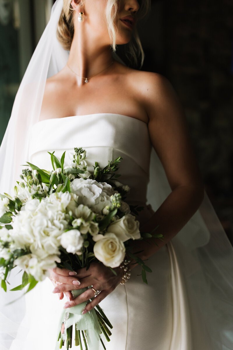 Bride holding floral bouquet taken by best northern california wedding photographers