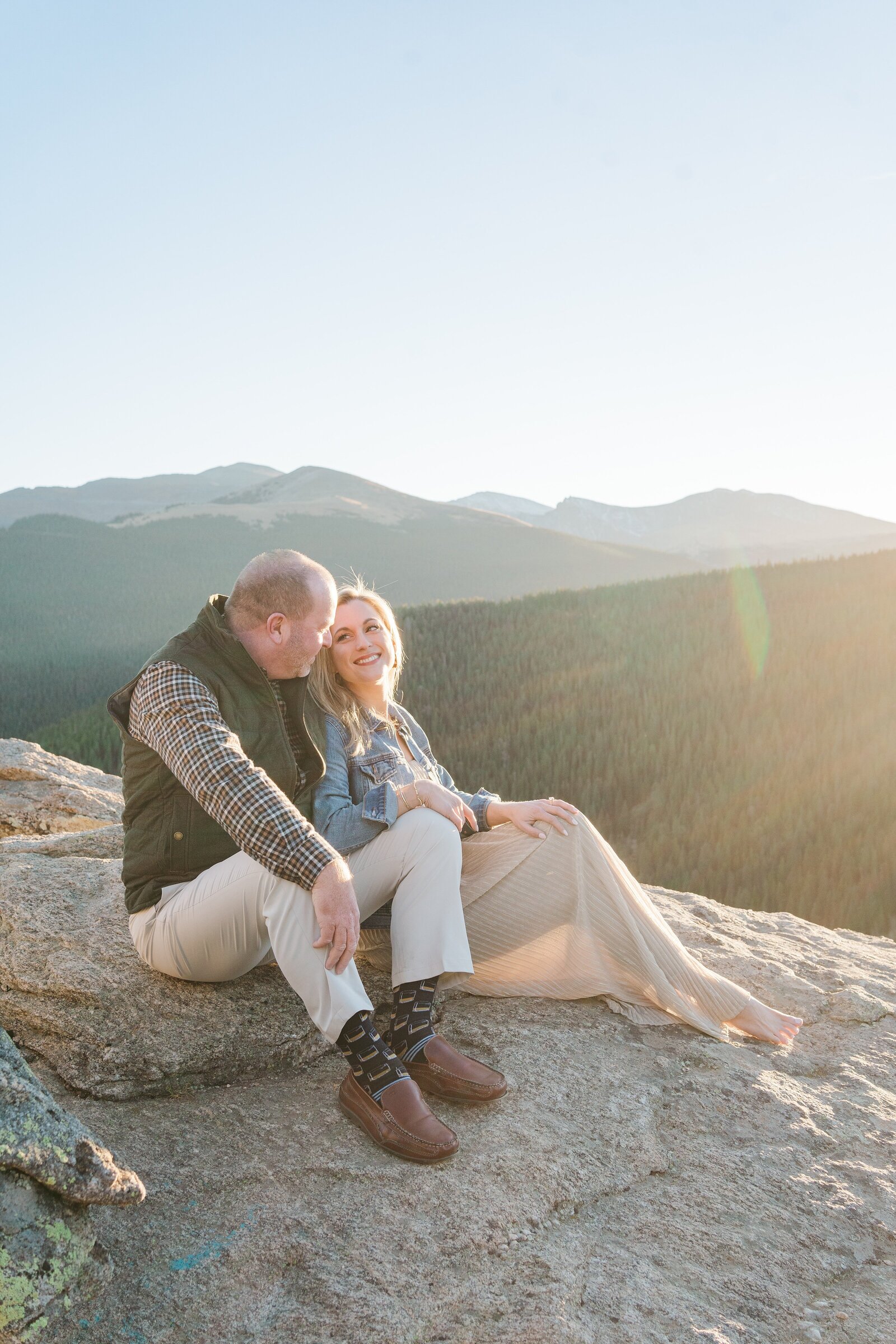 Say "I do" amidst the stunning beauty of Colorado's mountains with Samantha Immer Photography. Our natural light and scenic backdrop will create breathtaking wedding photos.