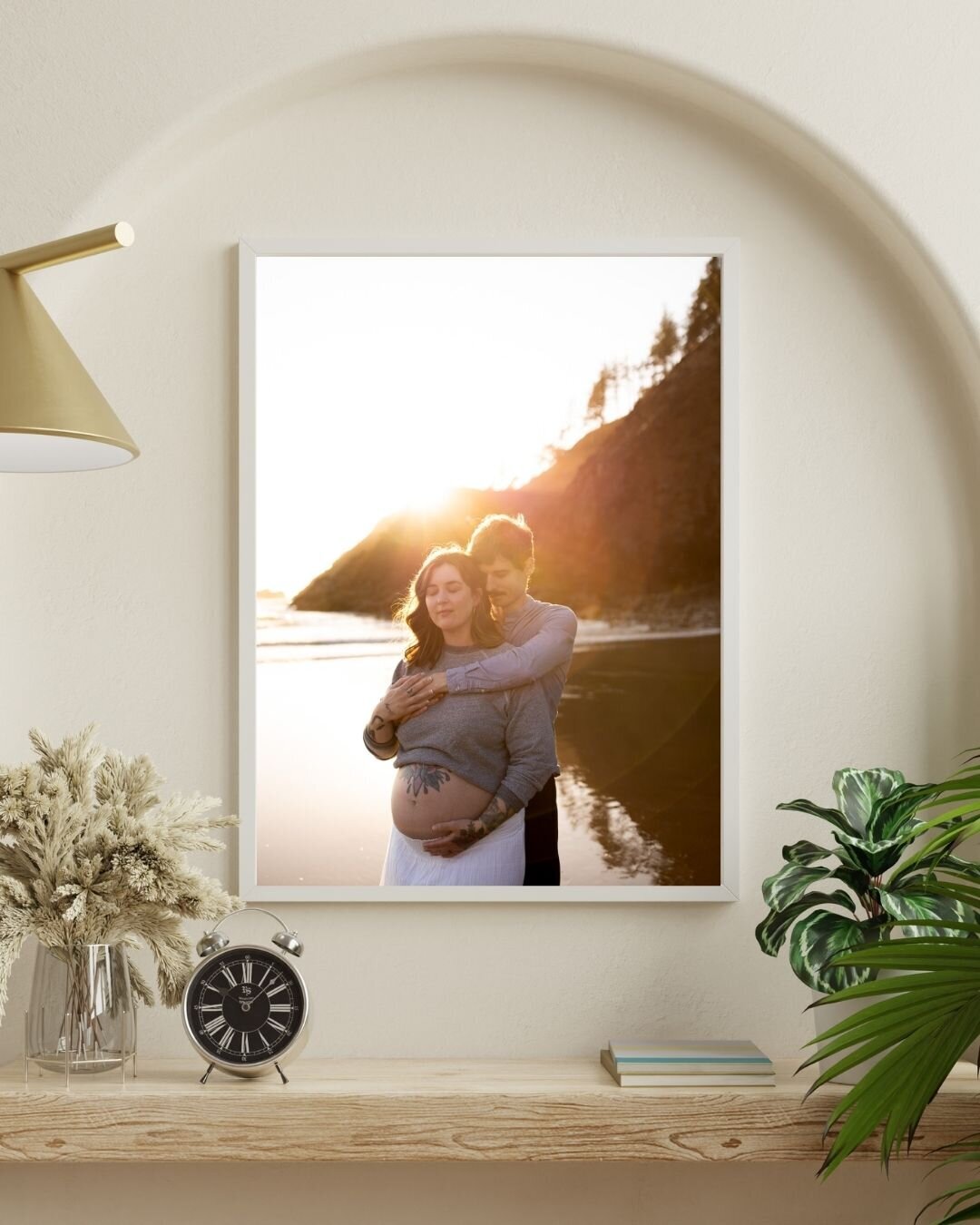 Portland couple embrace during a photoshoot at sunset as they expect their first baby. 