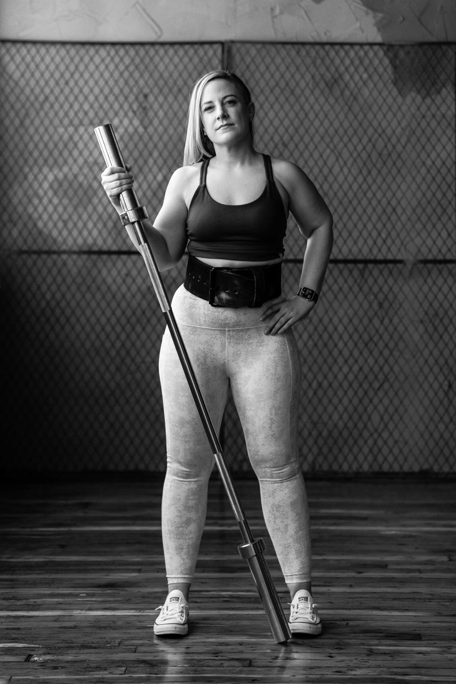 black and white photo of a fit woman