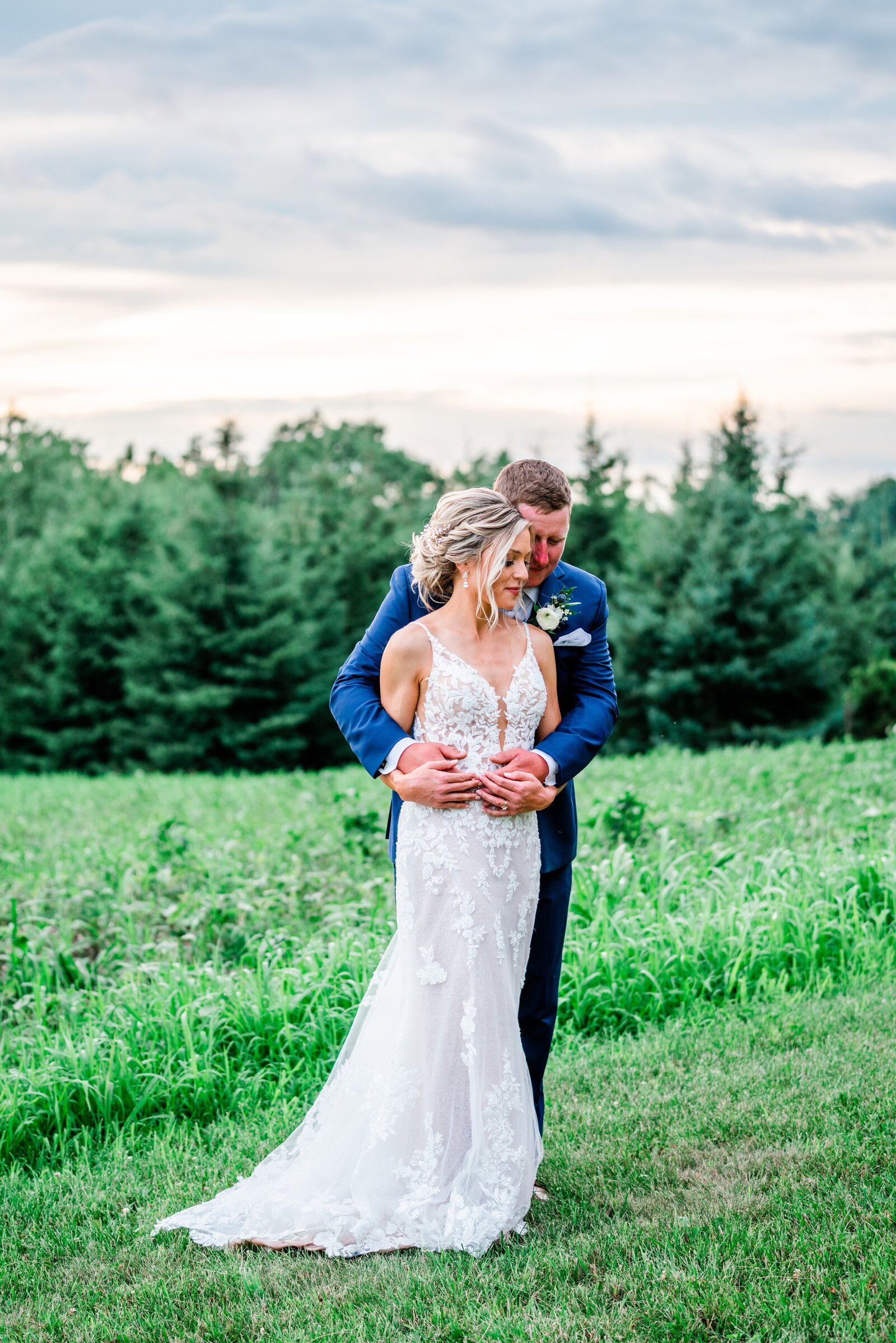 Bride and groom embracing