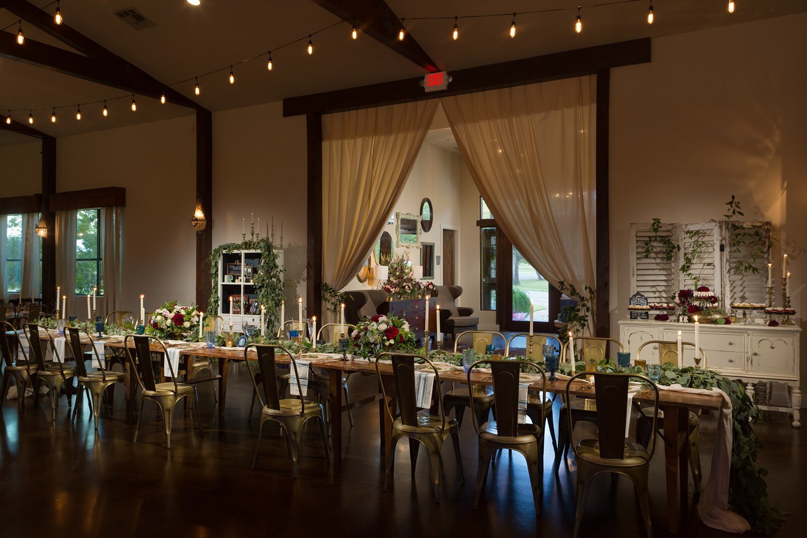 Dark and moody reception table at Pecan Springs Ranch
