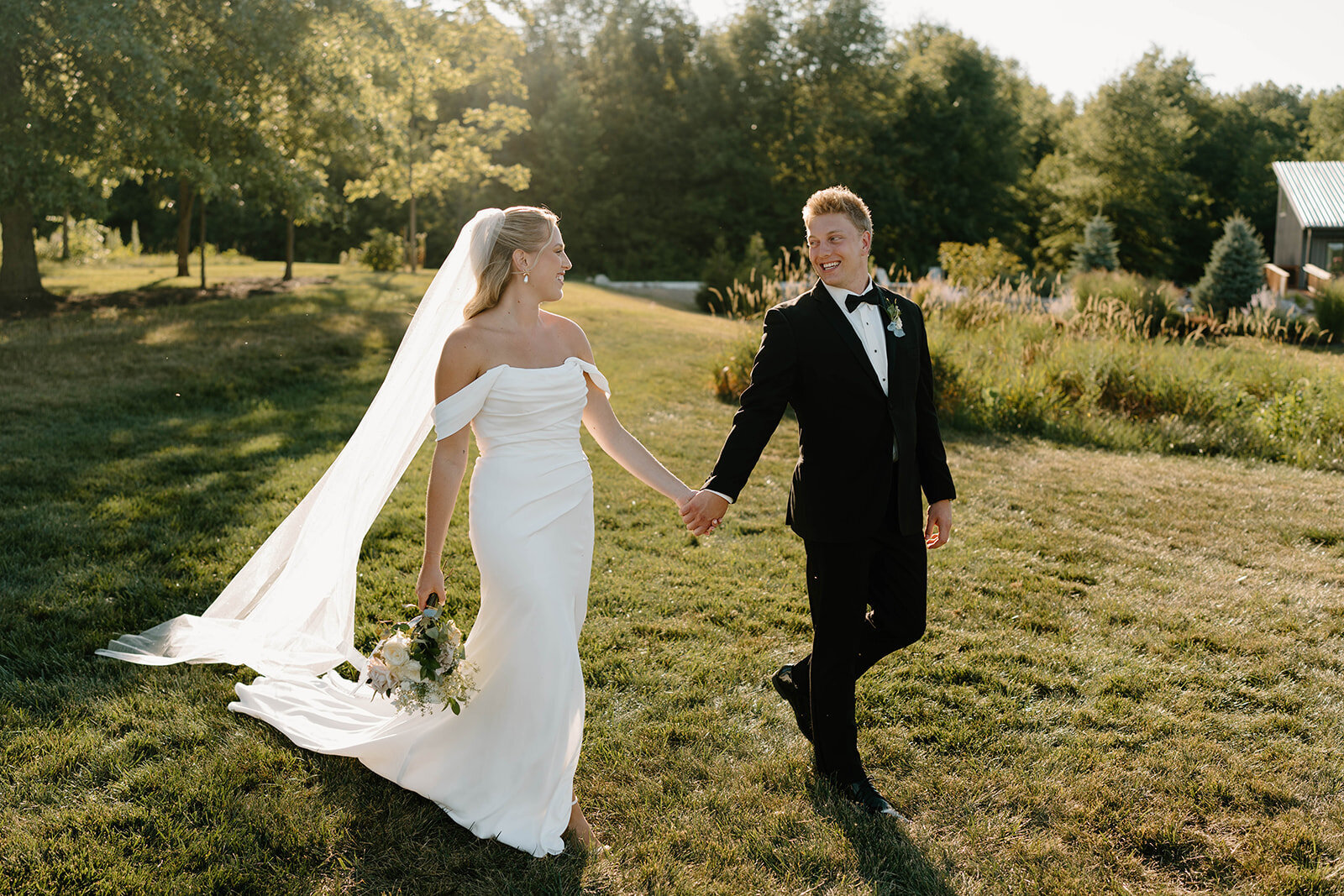 Experience the breathtaking moments from Stephanie and Grant Yeater’s wedding at Retreat 21 in Marysville, OH. This stunning outdoor oasis served as the perfect backdrop for their elegant celebration. From heartfelt vows in the garden-chic ceremony space to the joy-filled reception under panoramic views, every detail was thoughtfully curated for an unforgettable day. Explore their wedding gallery to relive these magical moments, captured with love and attention to every unique aspect of their day.