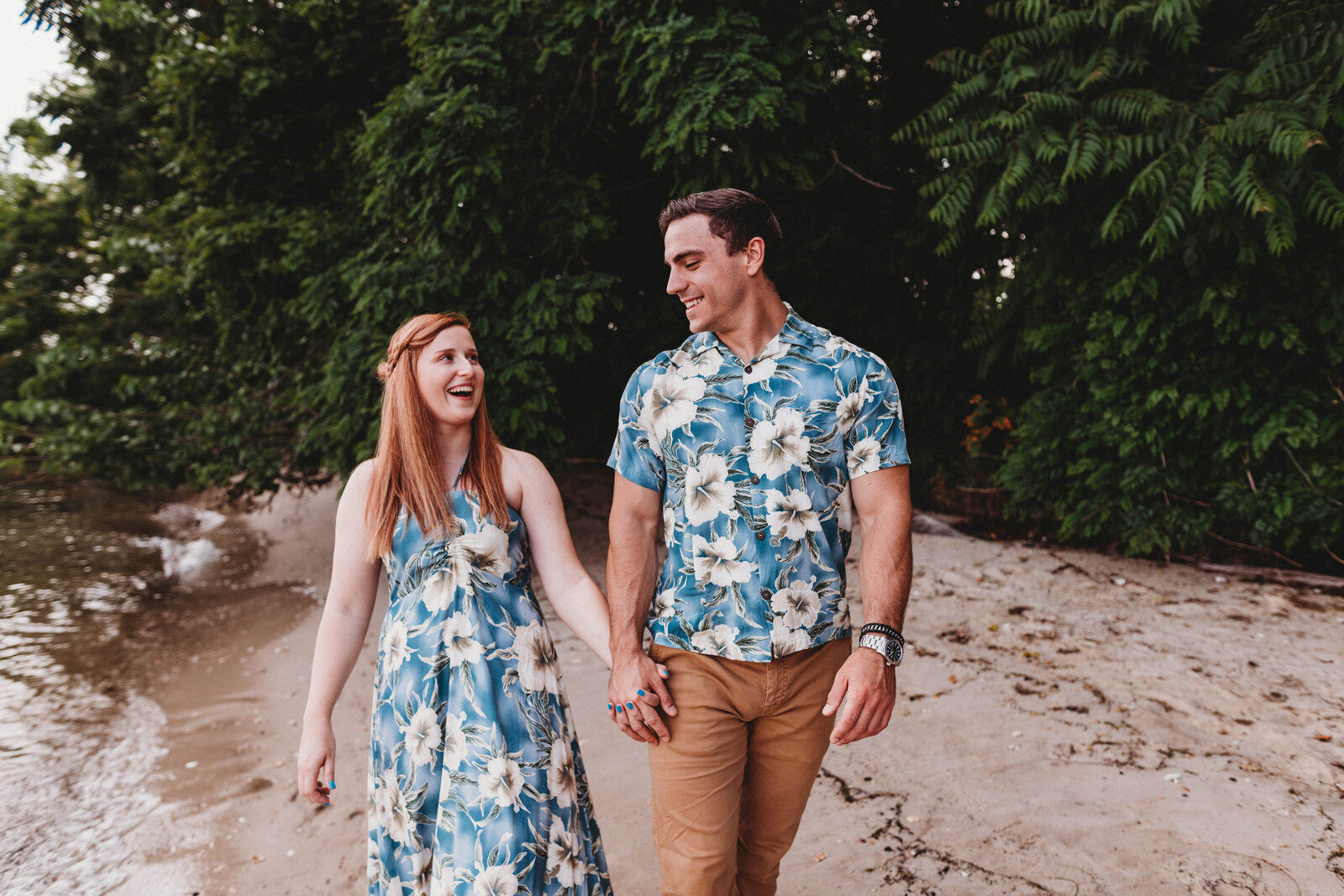 engagement photography in St. Michaels, Maryland on a beach with floral prints and love in the air